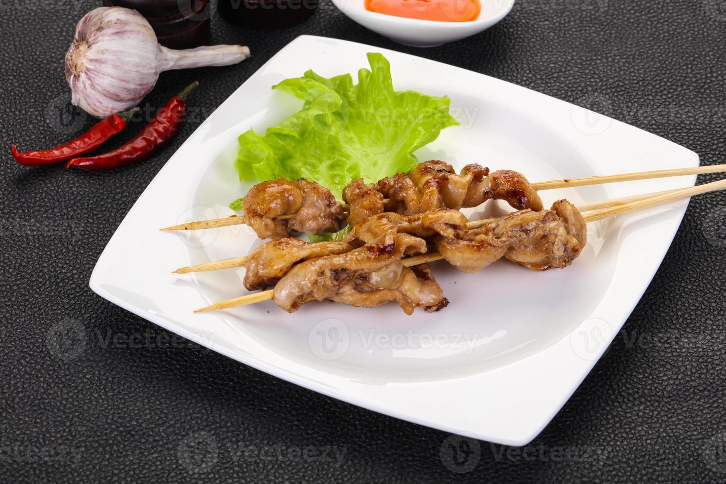 Chicken skin skewer photo