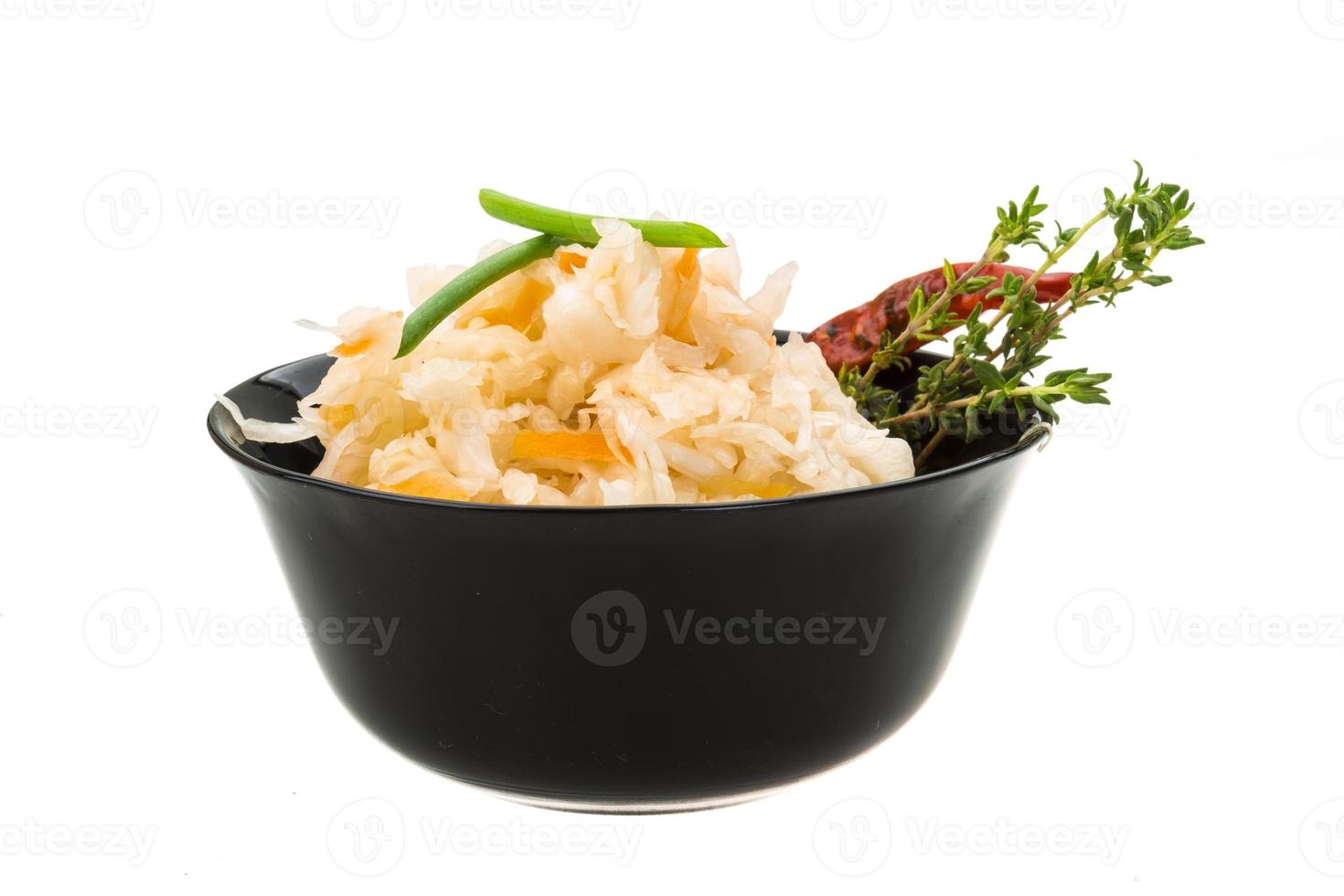 Fermented cabbage in dish photo