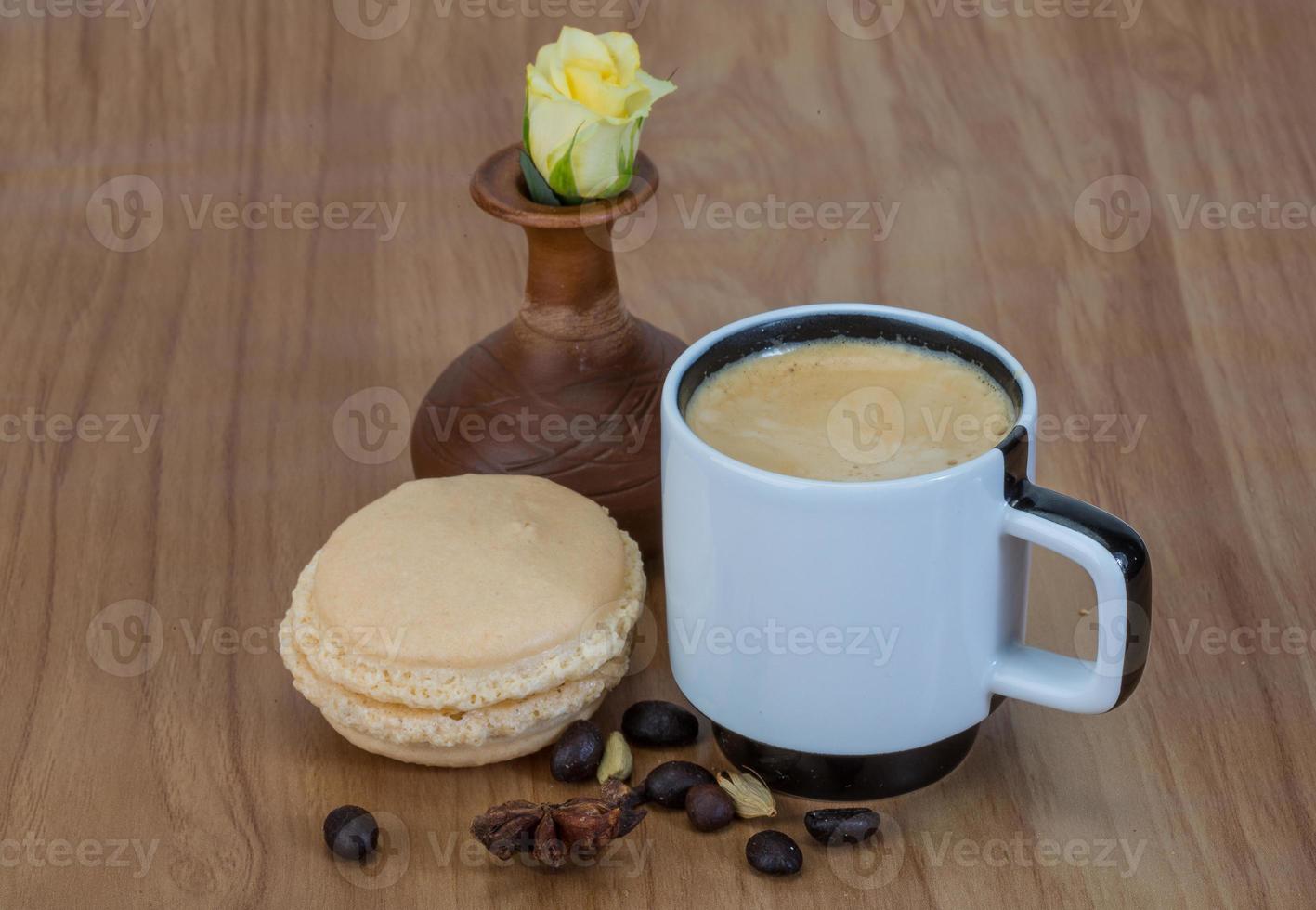 Coffee with macaroons and rose photo