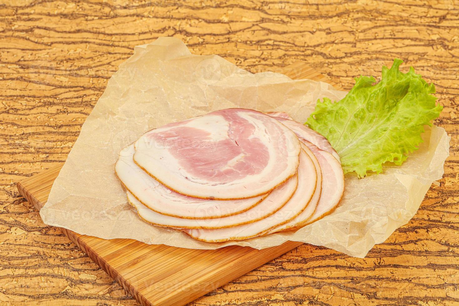 Sliced Pancetta sausage over board 8548179 Stock Photo at Vecteezy