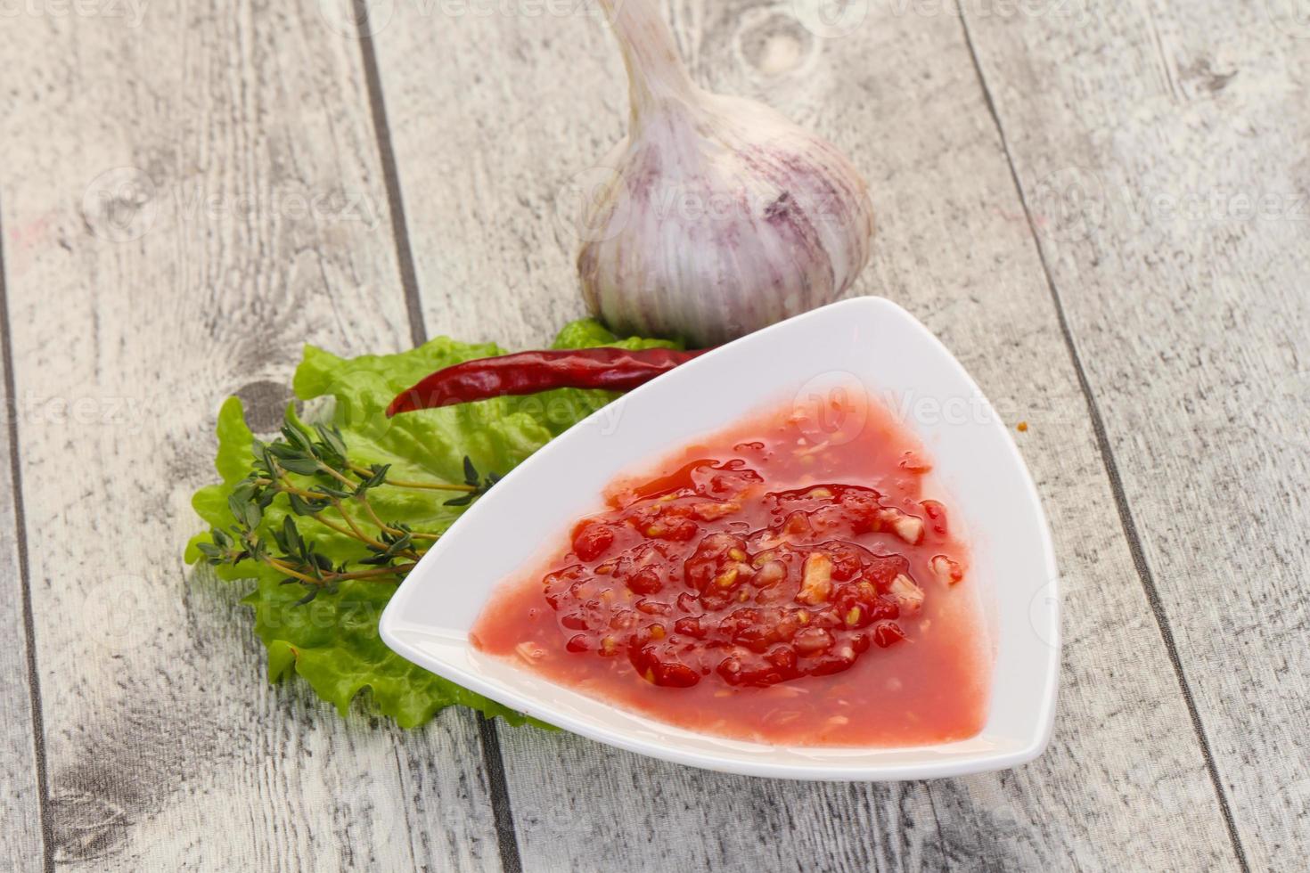 Spicy tomato and garlic sauce photo