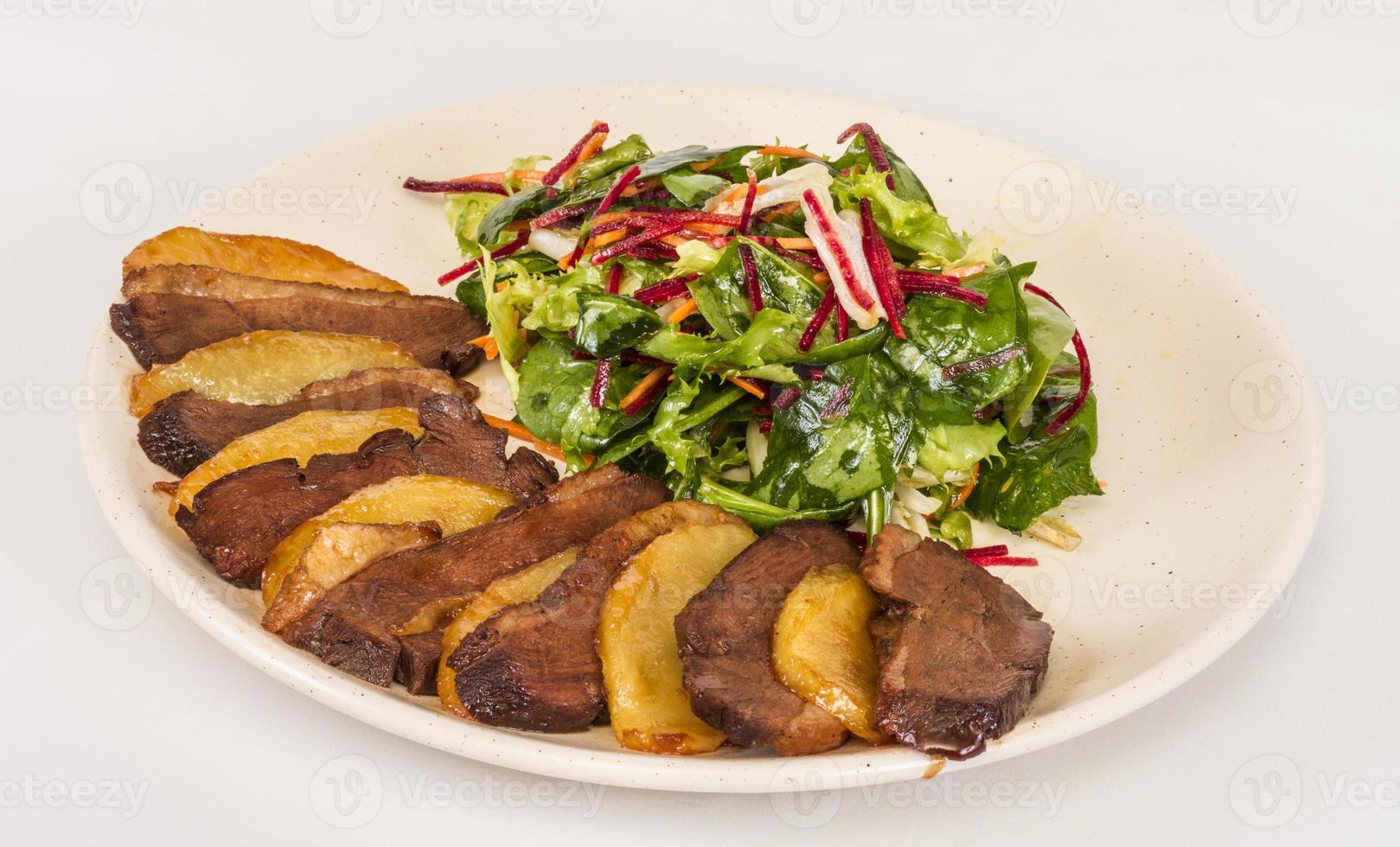 duck fillet, mashed potatoes seasoned with truffle oil, fig and aniseed sauce photo