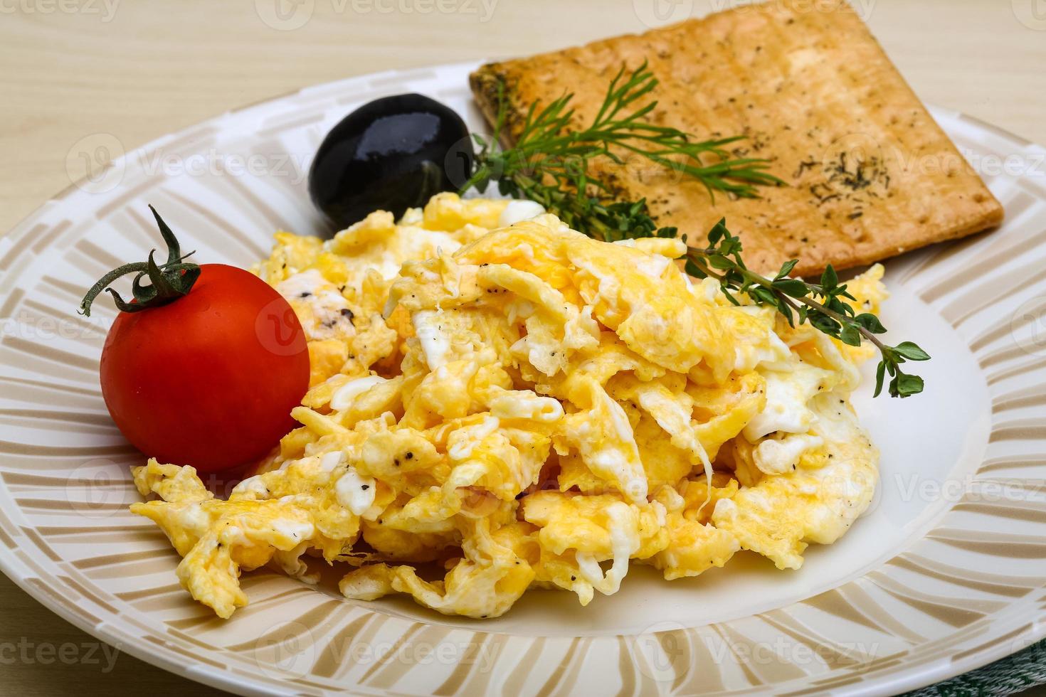 Scrambled eggs with tomato photo