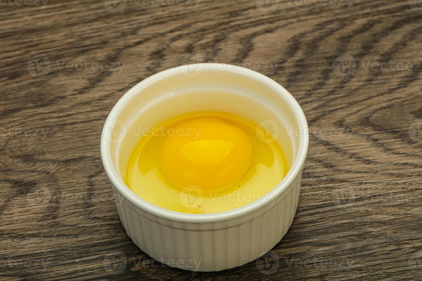 Raw Chicken egg in the bowl photo