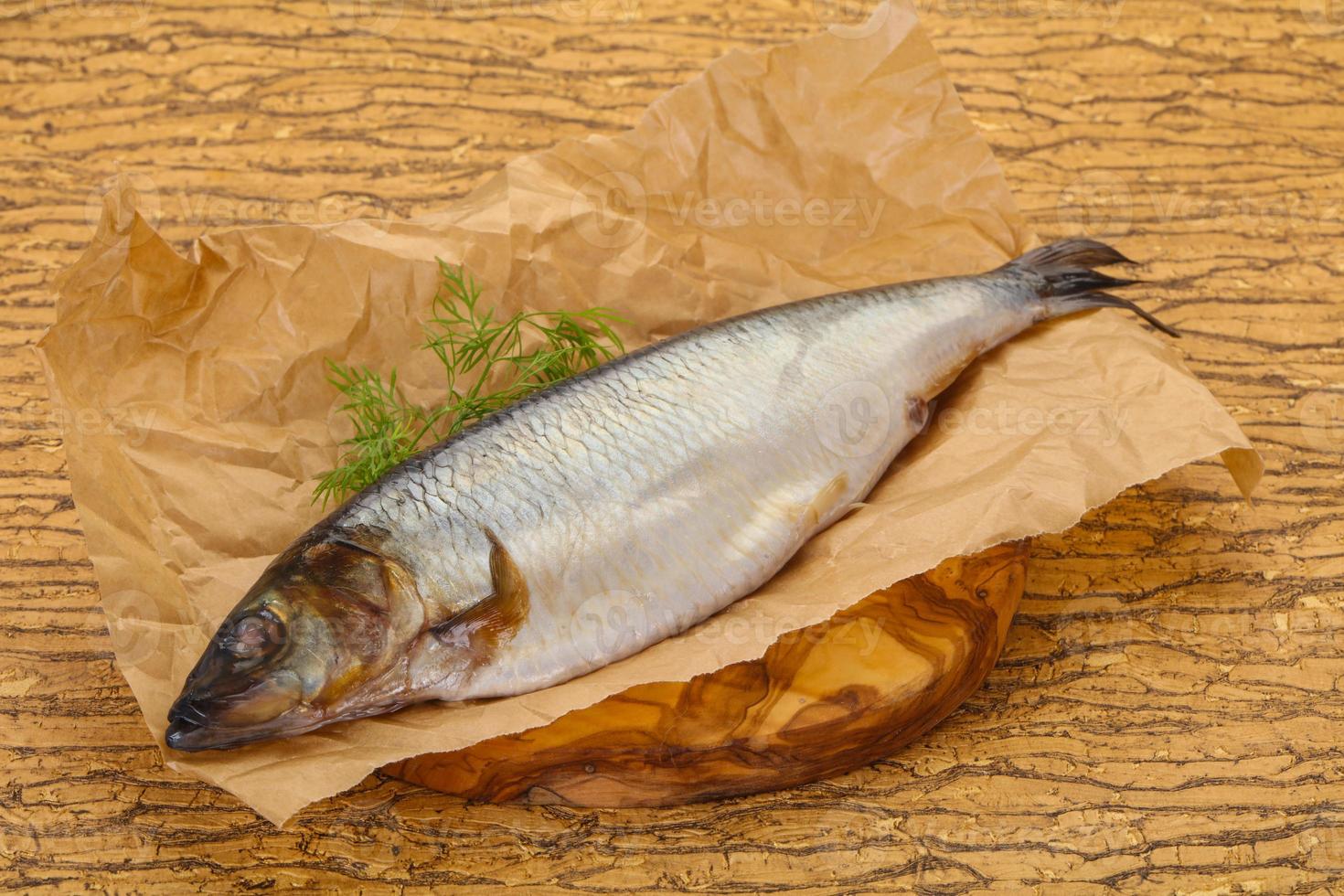Salted herring over the wooden board photo