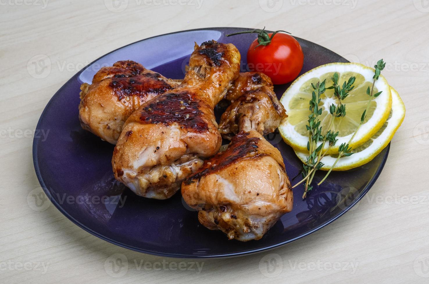 Roasted chicken legs photo