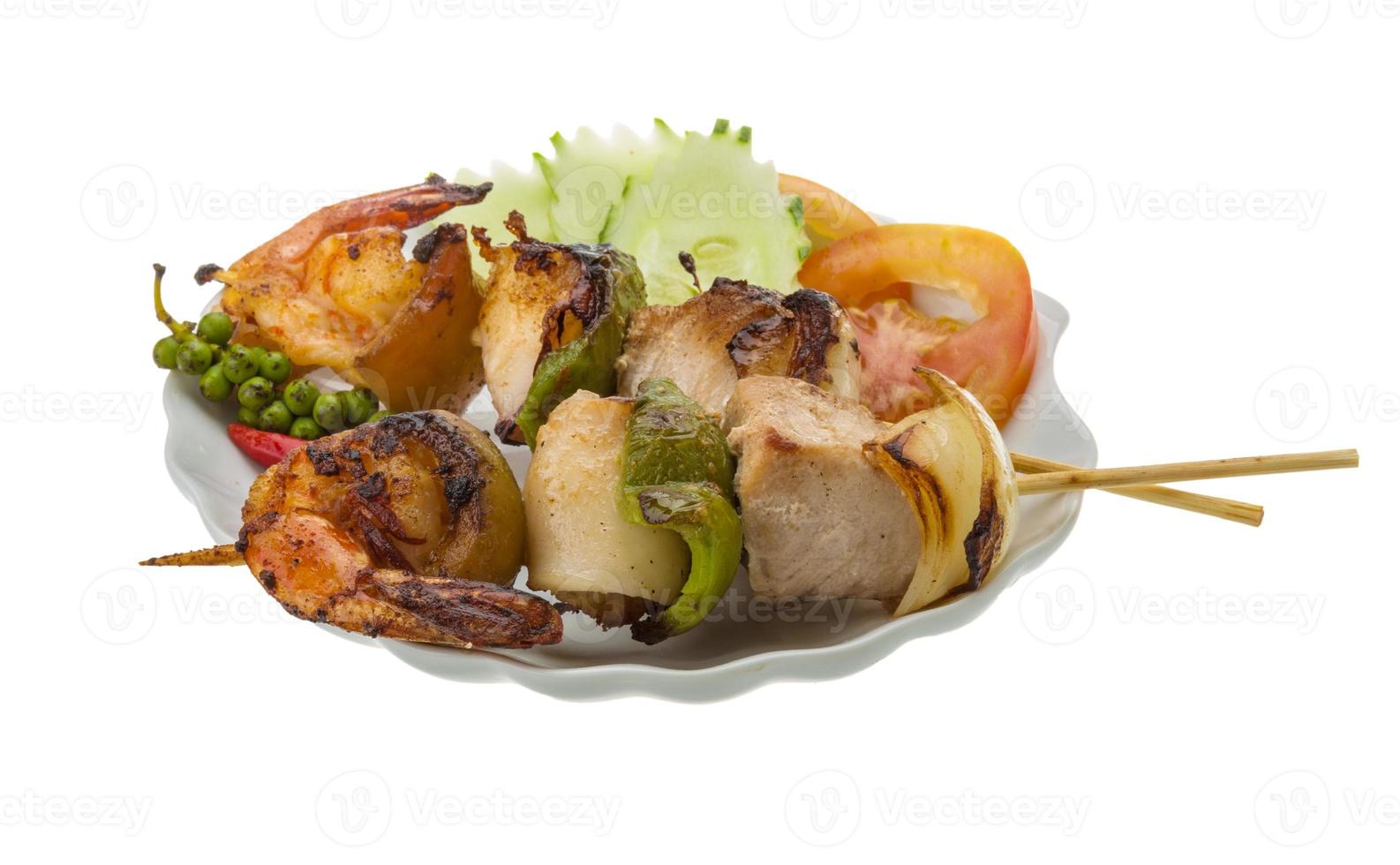 Seafood barbeque on white photo
