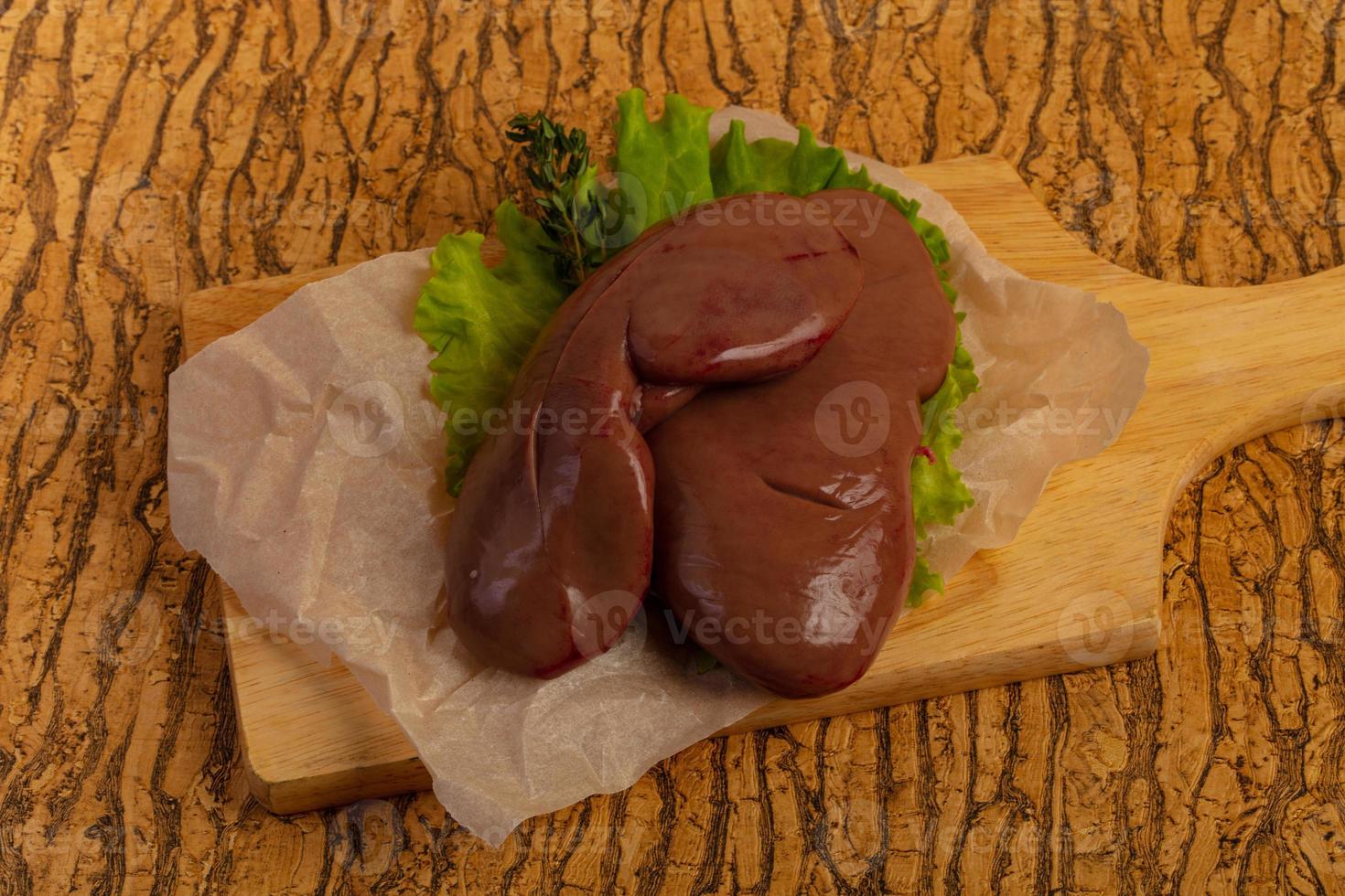 Raw pork kidneys photo