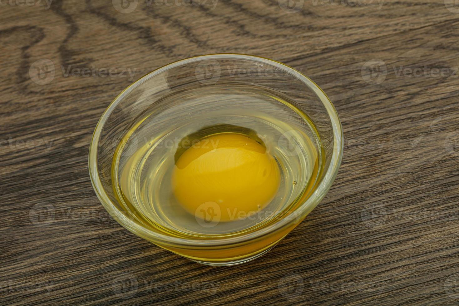 Raw Chicken egg in the bowl photo