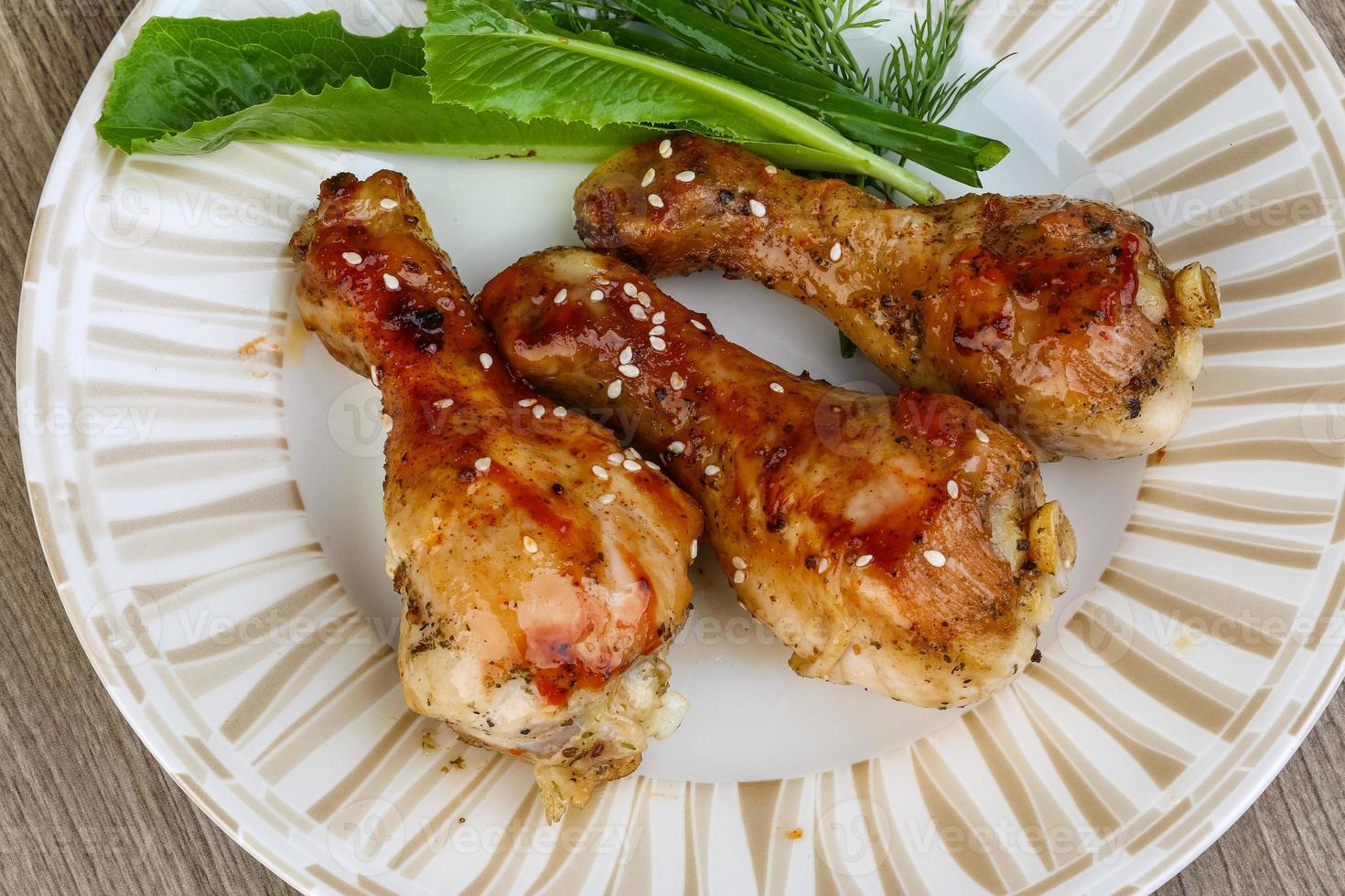Grilled chicken legs photo