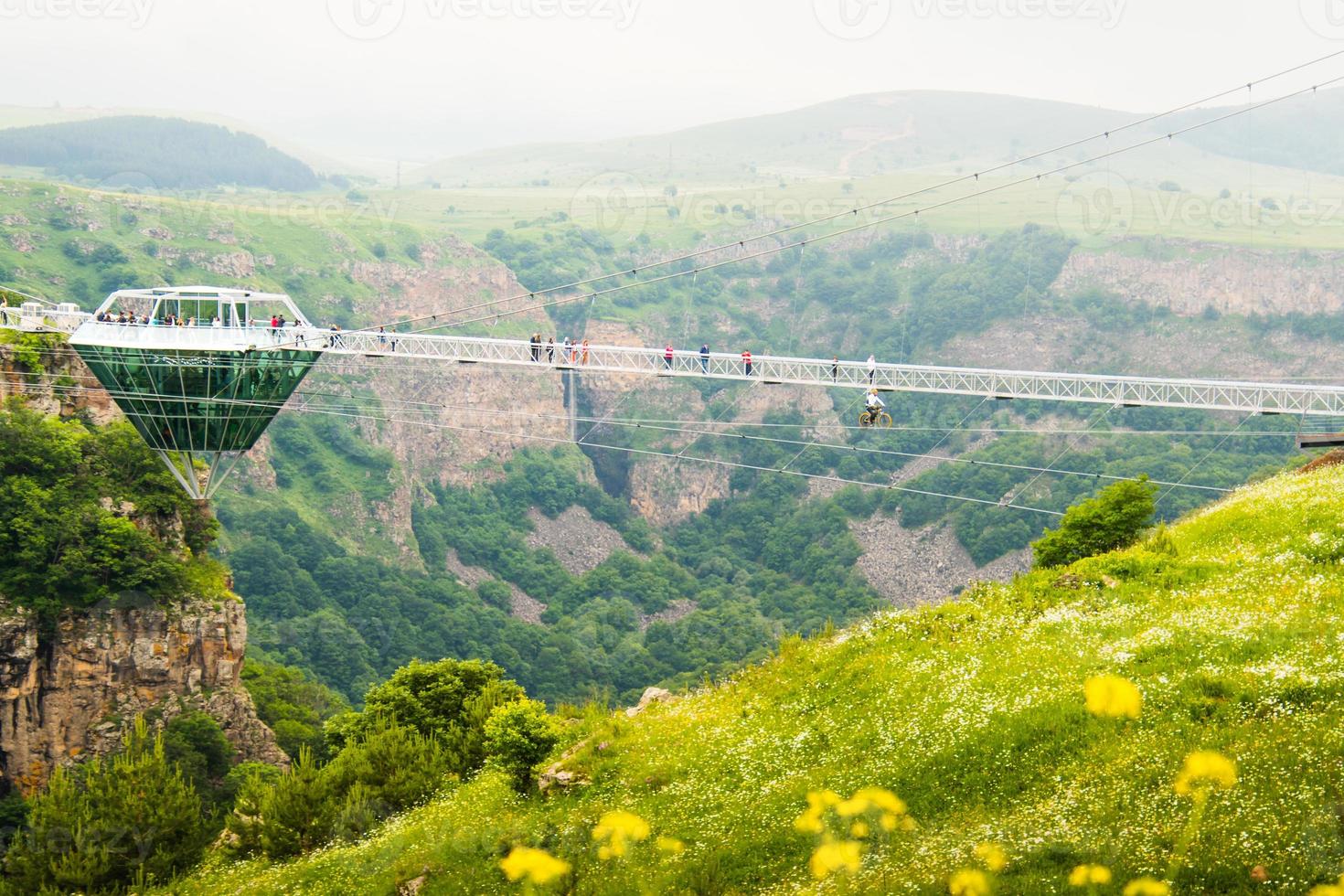 Dashbashi, Georgia , 2022 - static view Diamond shape platform on glass bridge over scenic dashbashi valley in Georgia countryside. Famous modern bridge over valley in caucasus photo
