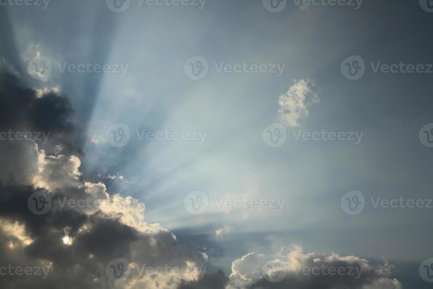 Dramatic sky with sun beam photo