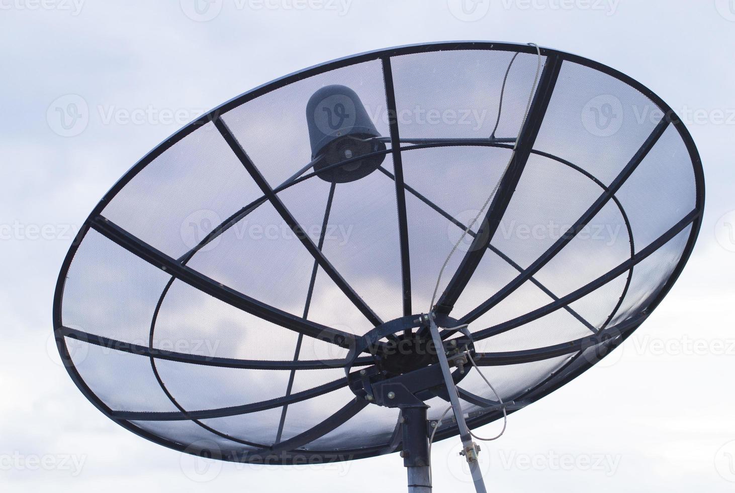 Satellite dish transmission data with blue sky background photo
