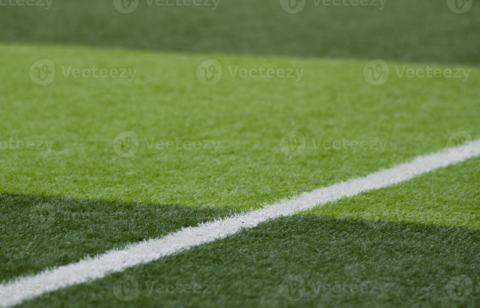 Artificial green grass background photo