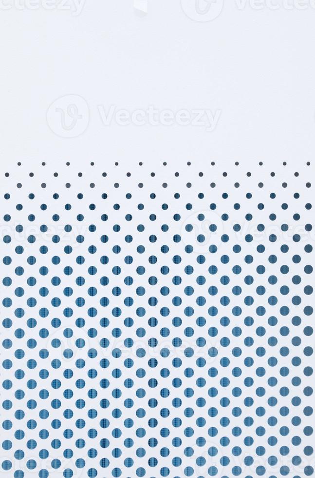 White perforated grid seamless grid pattern or background. photo