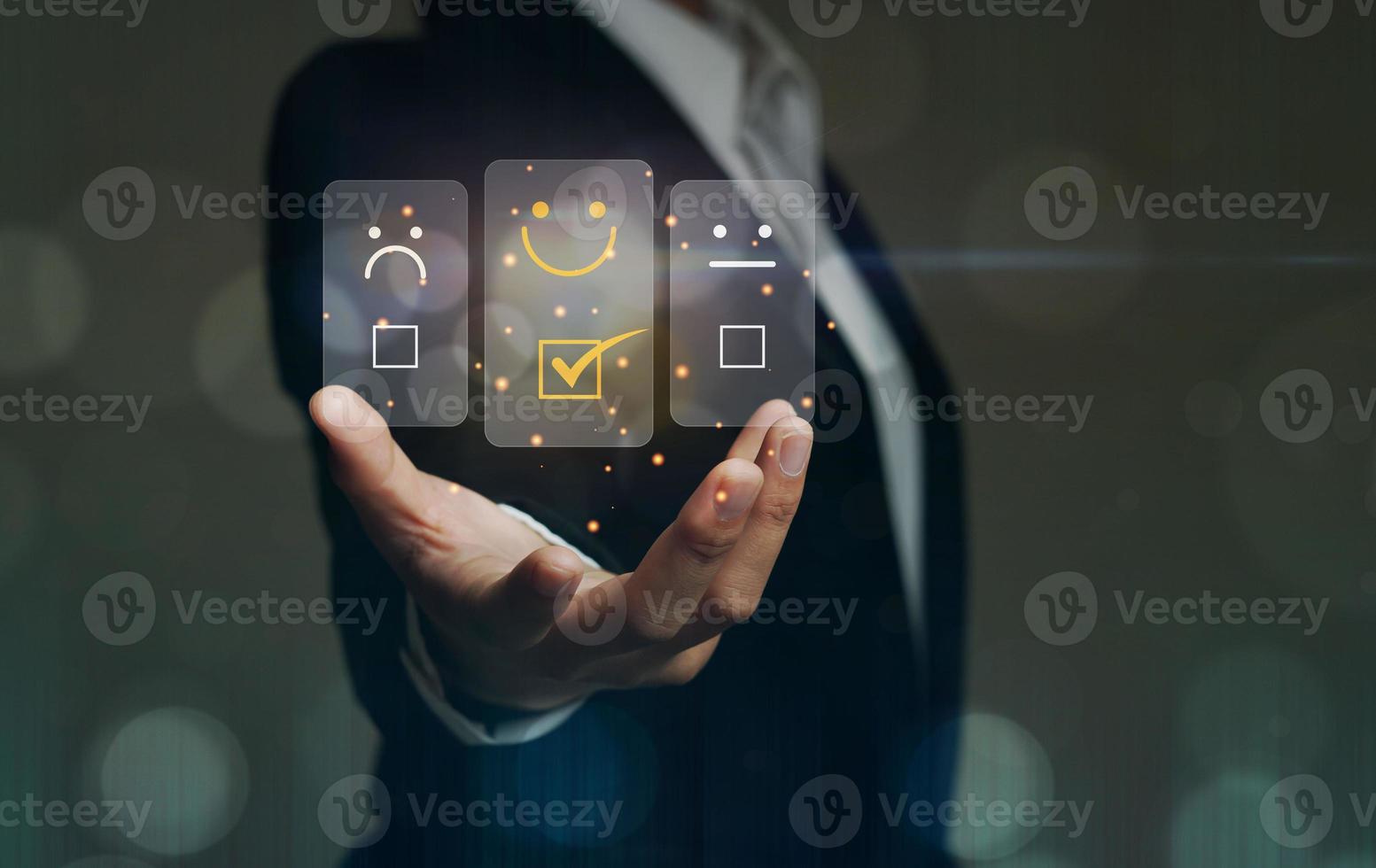 A business woman uses a customer rating service. In the service experience on the online application, the rating evaluates the concept of customer feedback. with rating icon photo