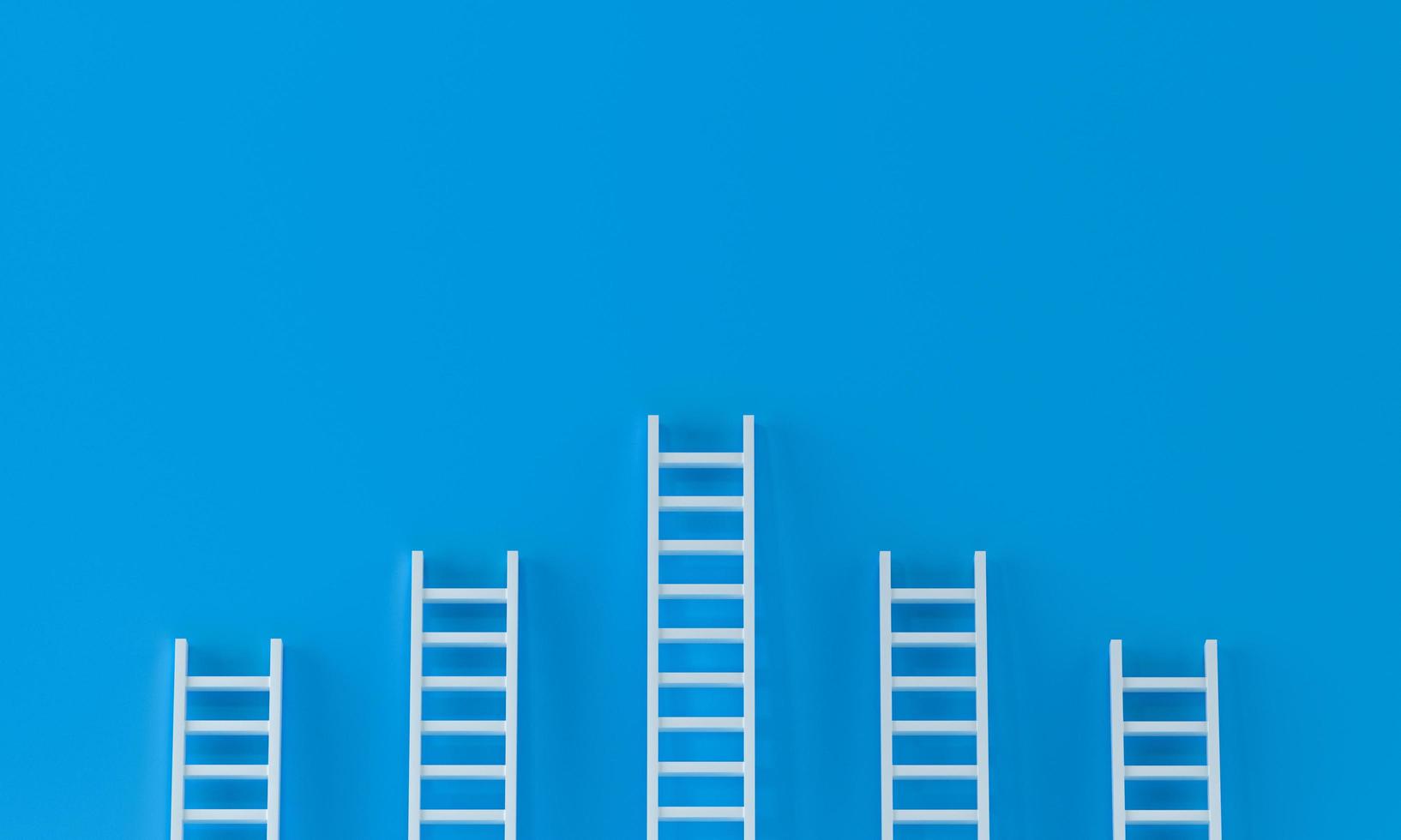 Ladder achievement concept on blue wall studio background. leadership, success concept with copy spaces for text. 3d rendering. photo