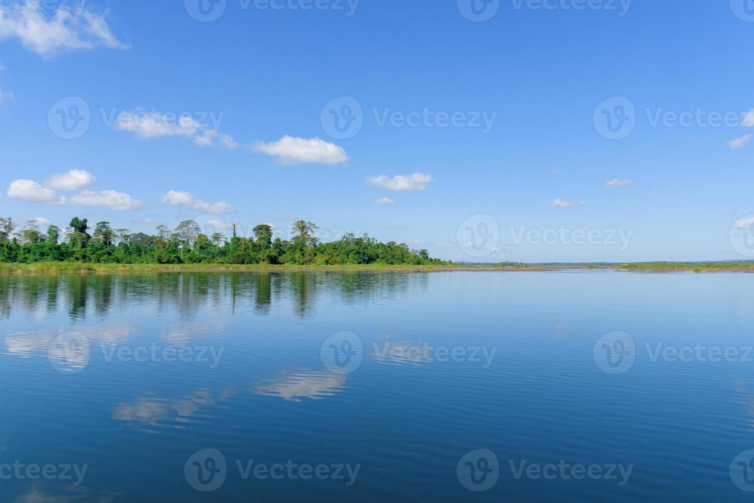 Large island in the lake. There is a beautiful cloud reflecting on the water At  Bueng Kan Province of Thailand 5 photo