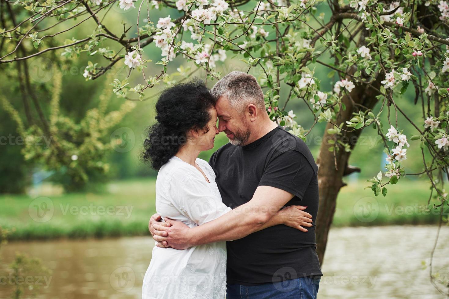 Pure love. Cheerful couple enjoying nice weekend outdoors. Good spring weather photo