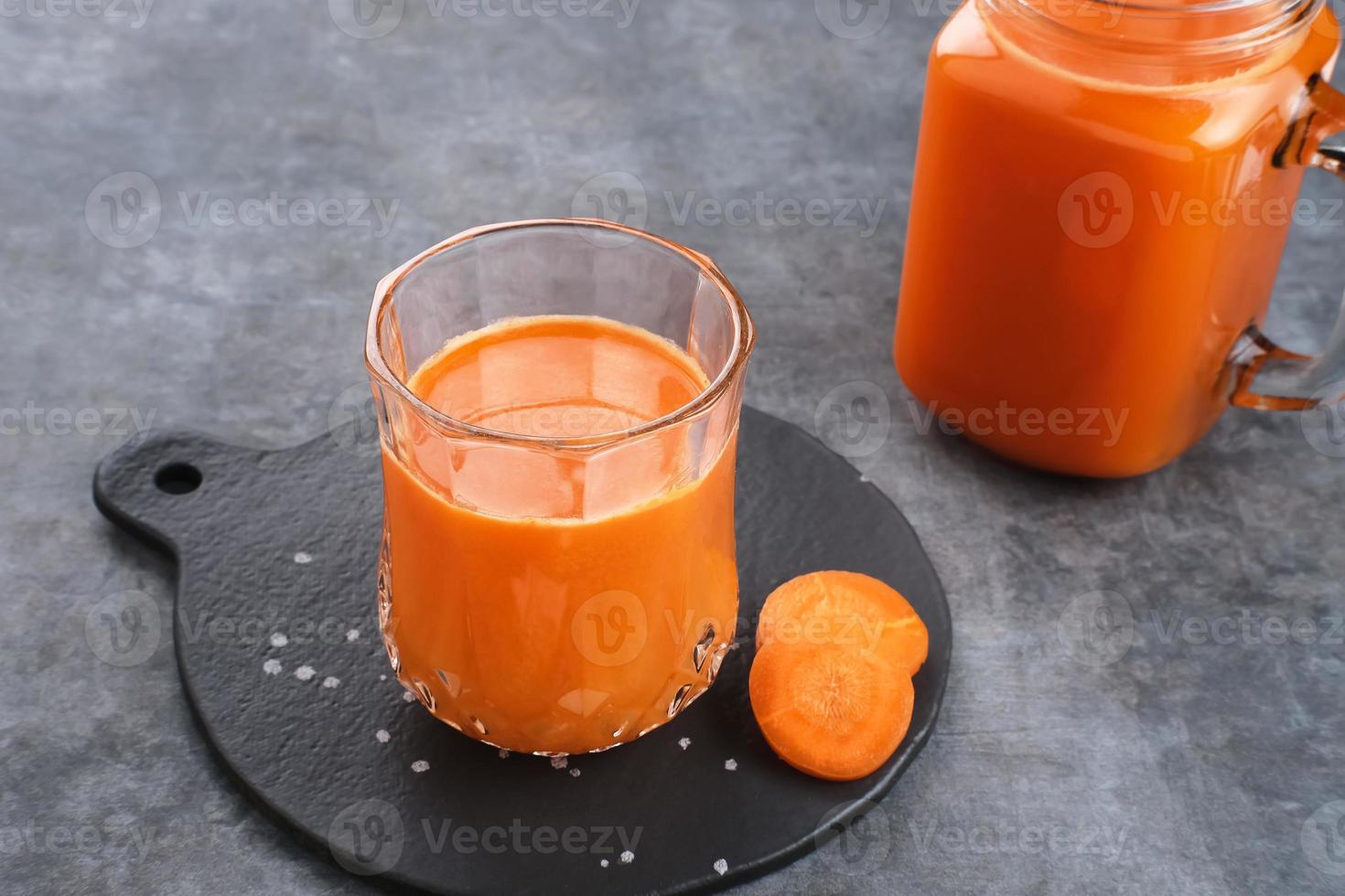 A glass of fresh carrot juice, very good for health. photo