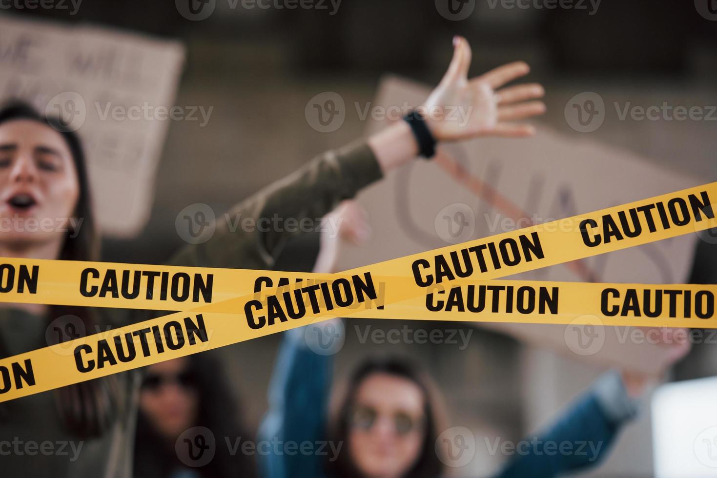 Blurred motion. Group of feminist women have protest for their rights outdoors photo