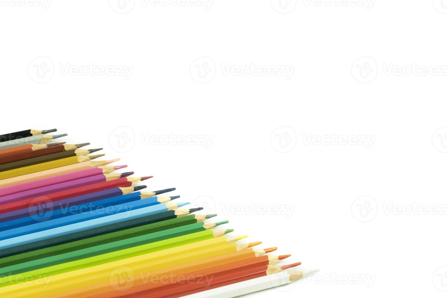 Beautiful blunt colour pencils are arranged together ready to use, it's on the white background. photo