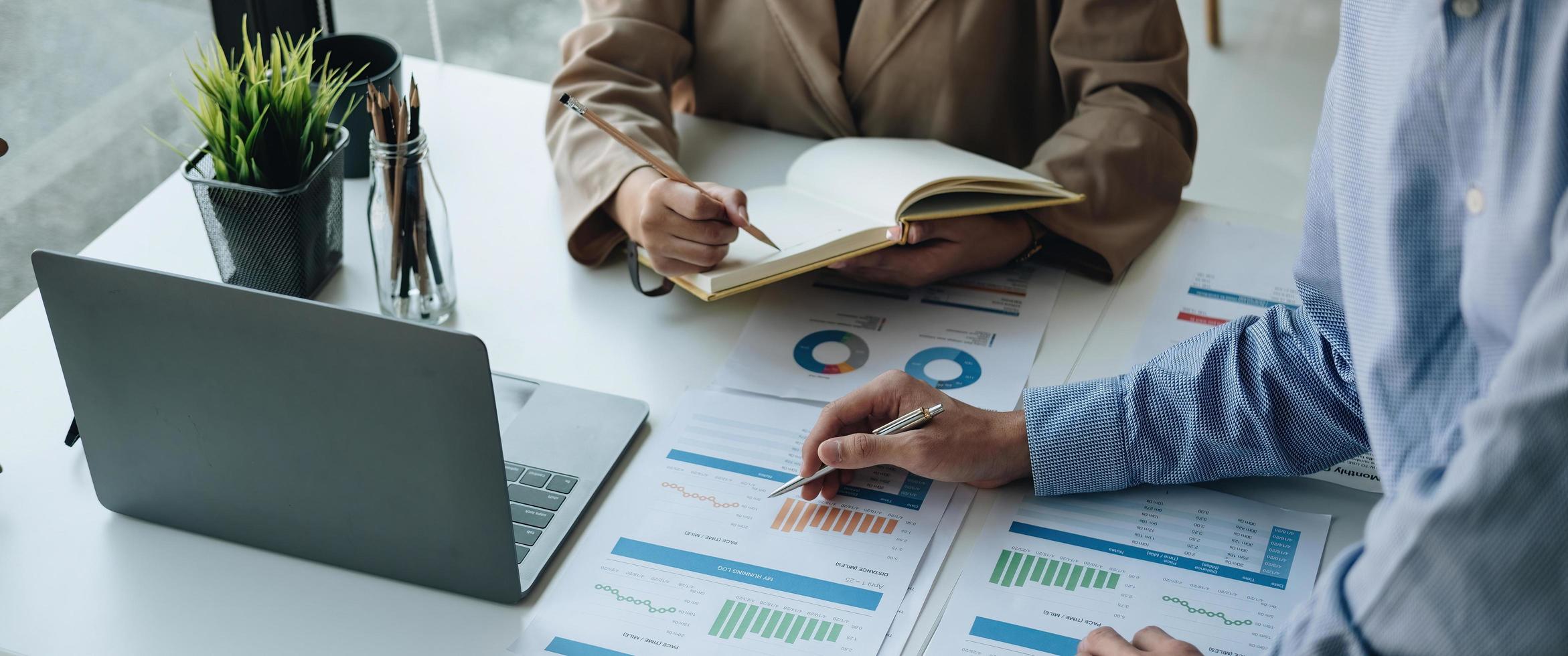 Asian business adviser meeting to analyze and discuss the situation on the financial report in the meeting room.Investment Consultant, Financial advisor and accounting concept photo