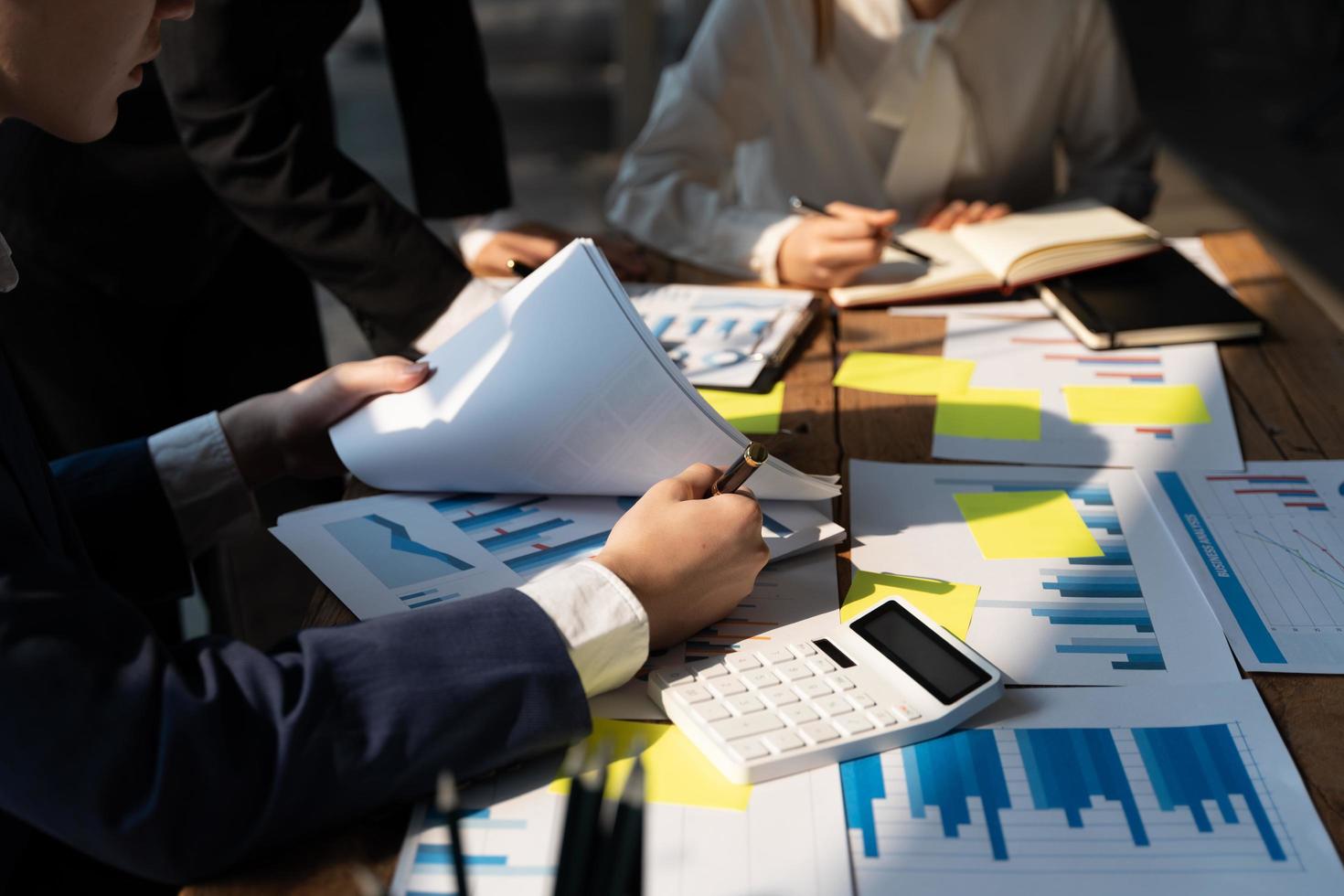 Business financial, accountant discussing with partner are meeting to audit finance planning sales to meet targets set in next year. stock market concept photo