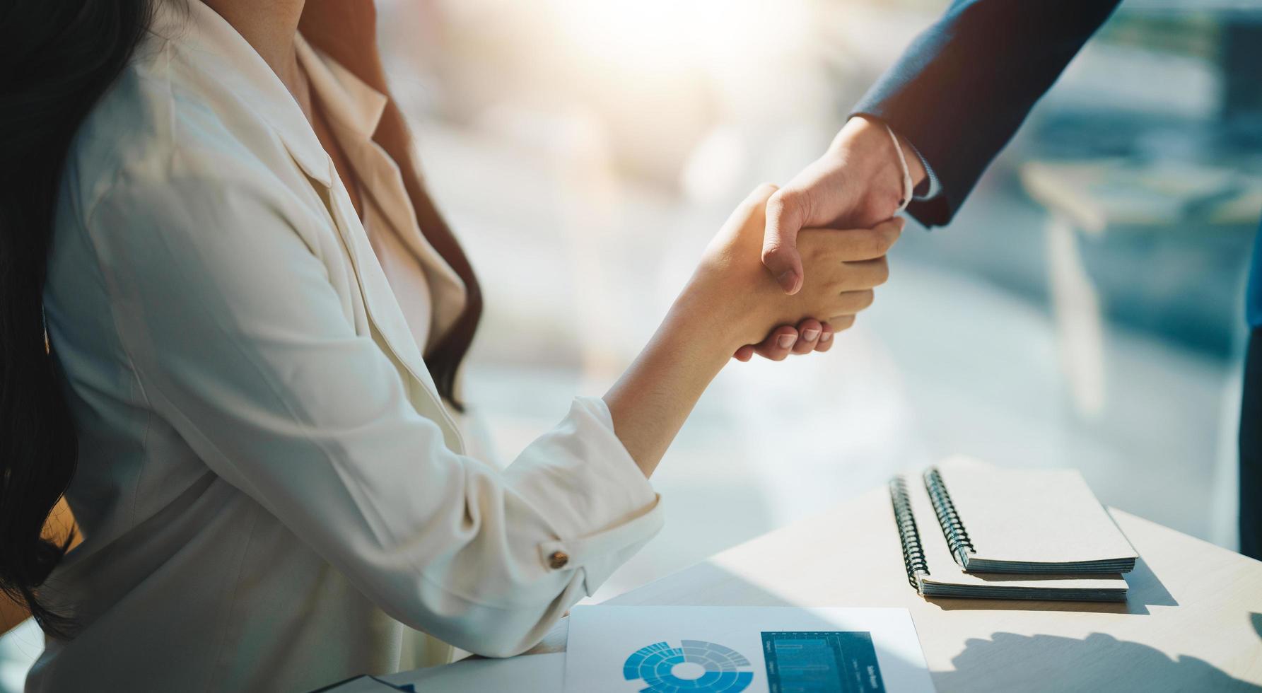 business partnership handshake concept.Photo two businessman handshaking process.Successful deal after great meeting photo