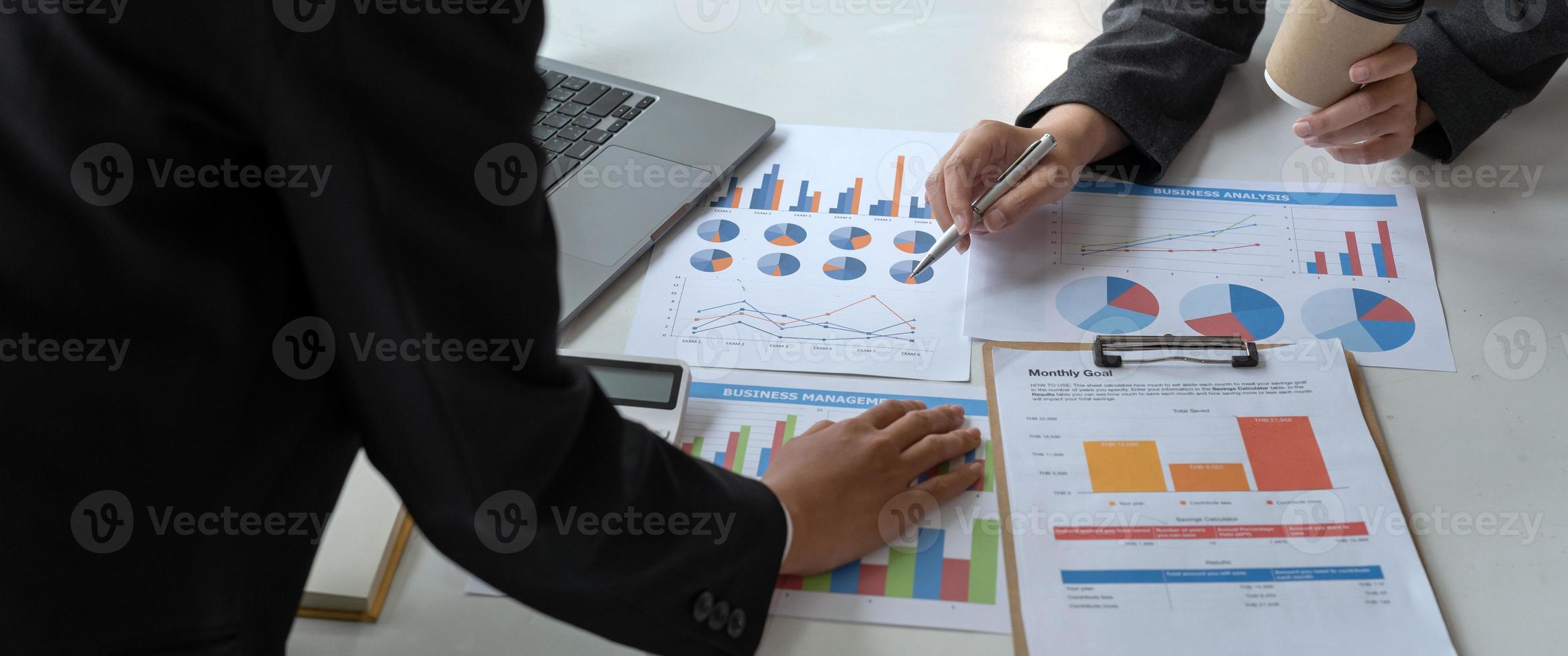 Asian business adviser meeting to analyze and discuss the situation on the financial report in the meeting room.Investment Consultant, Financial advisor and accounting concept photo