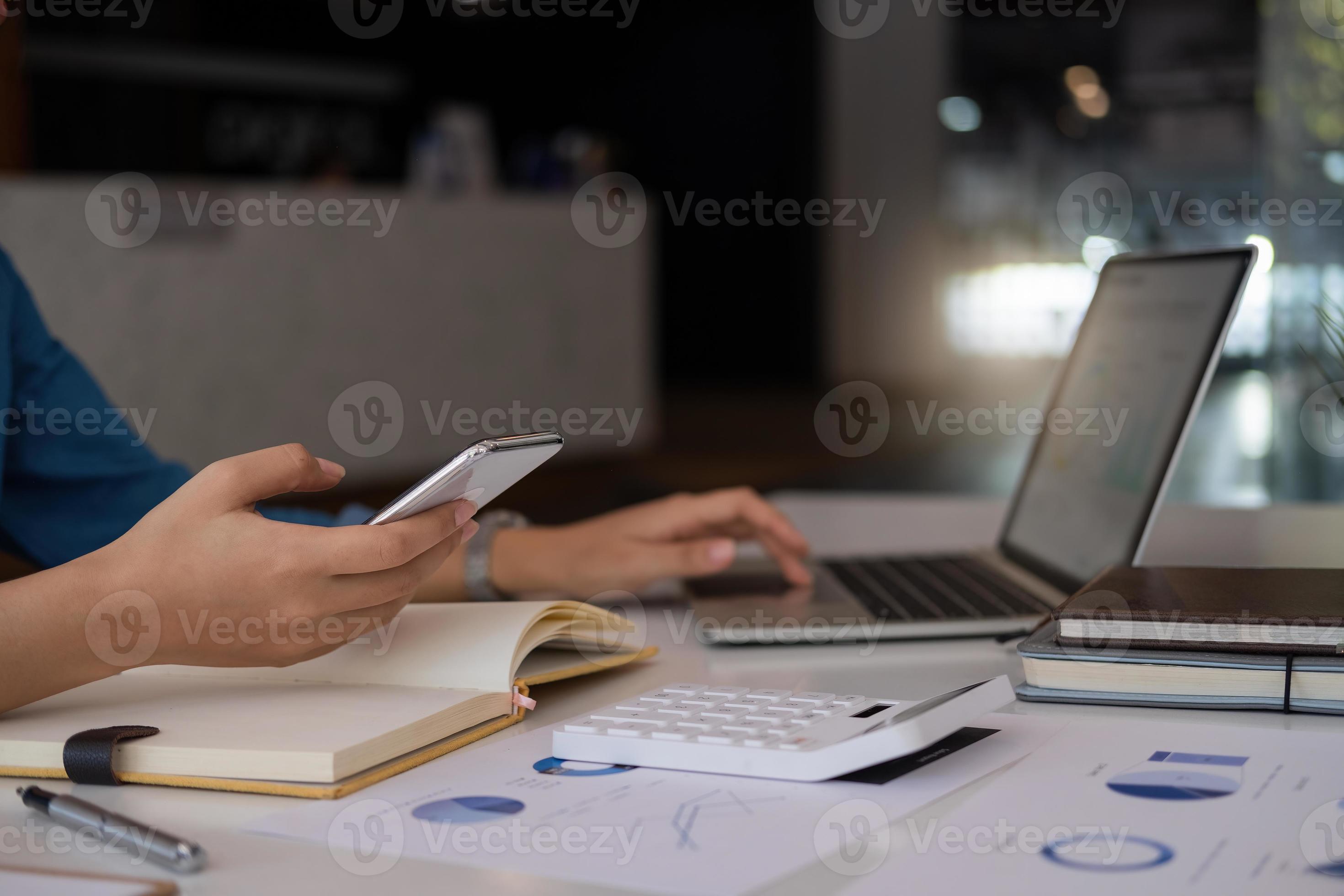 Close up business woman hand using mobile smartphone and
