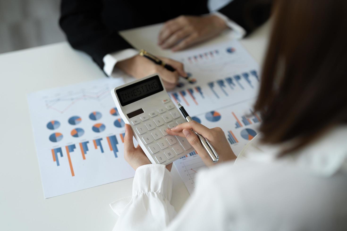 Business People Meeting to analyse and discuss and brainstorming the financial report chart data in office Financial advisor teamwork and accounting concept photo