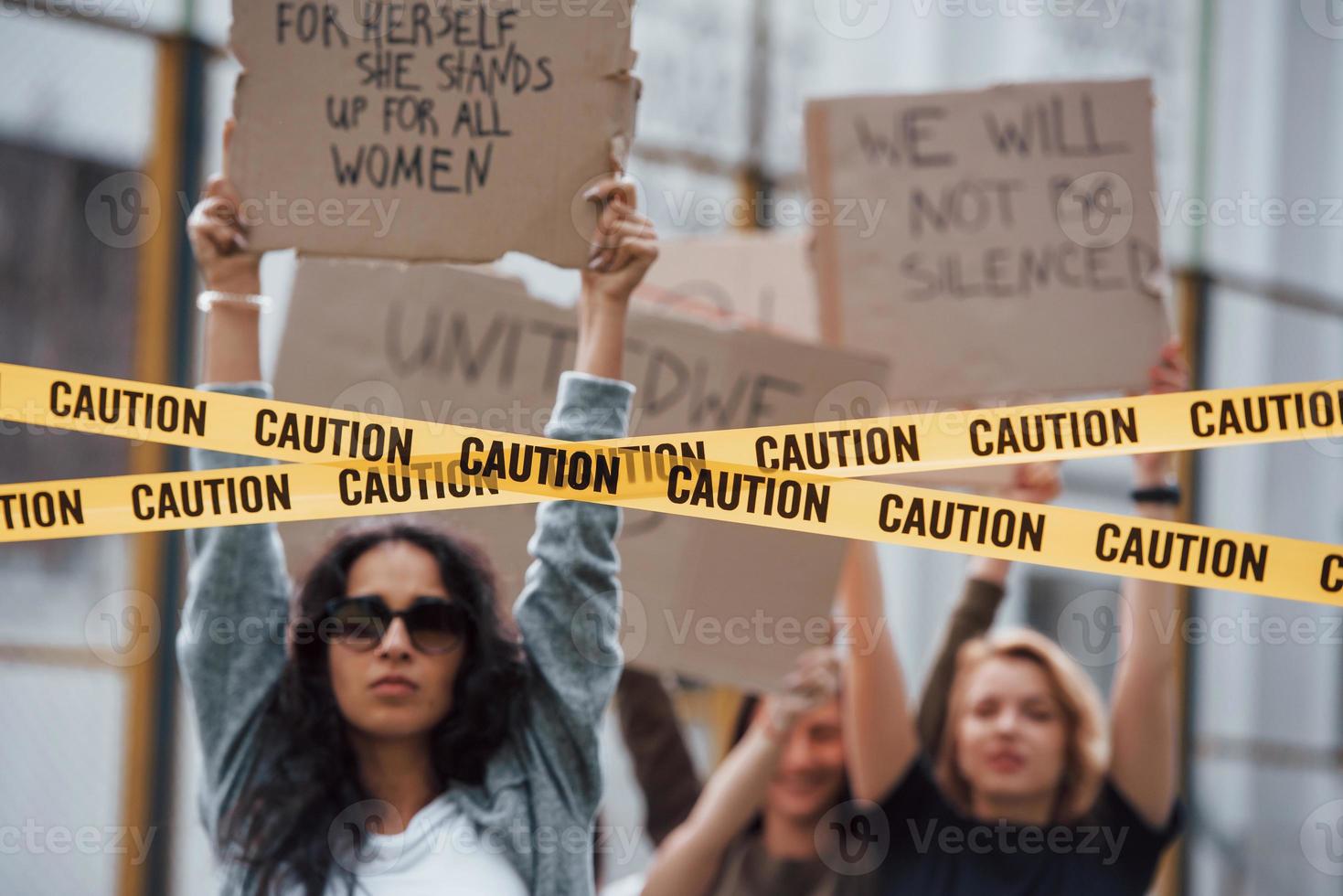 Active and energetic. Group of feminist women have protest for their rights outdoors photo
