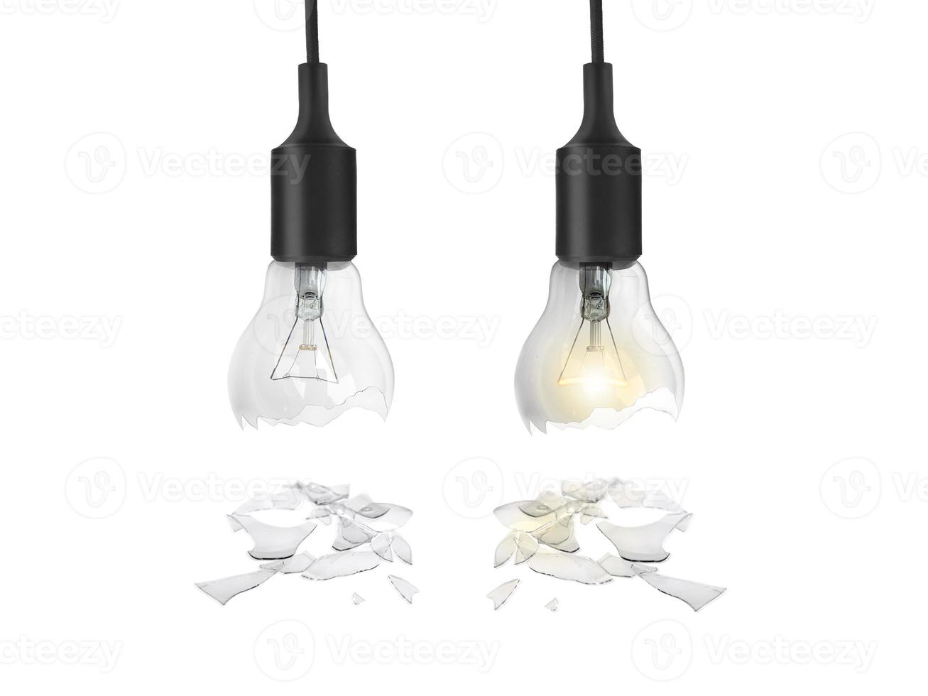 Broken light bulb isolated on white background photo