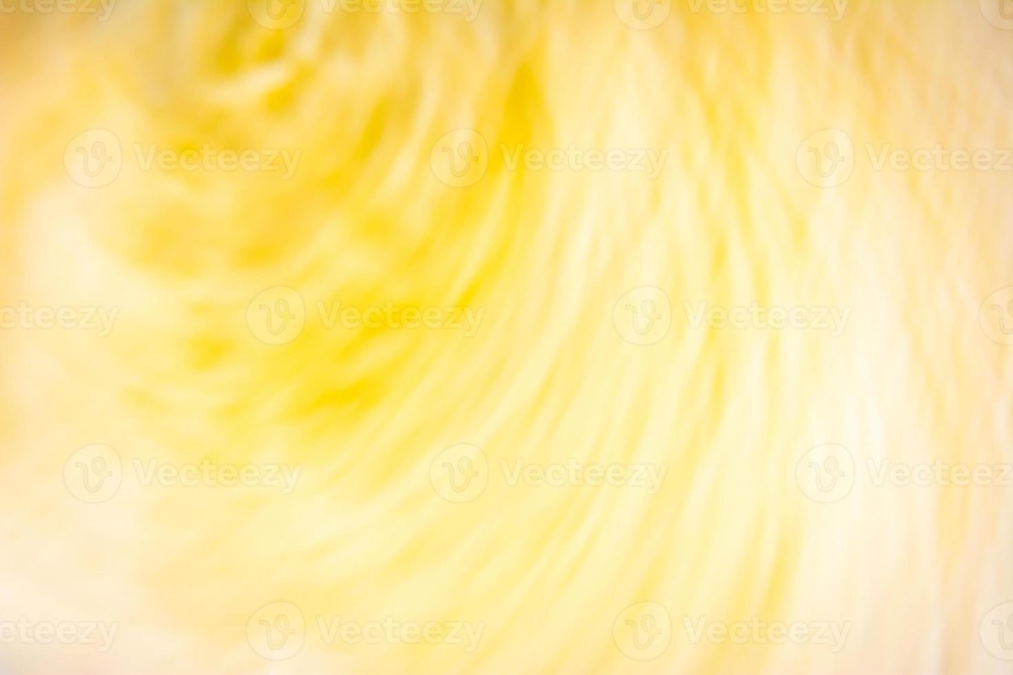 Abstract sunny day. Yellow wavy swirls. photo