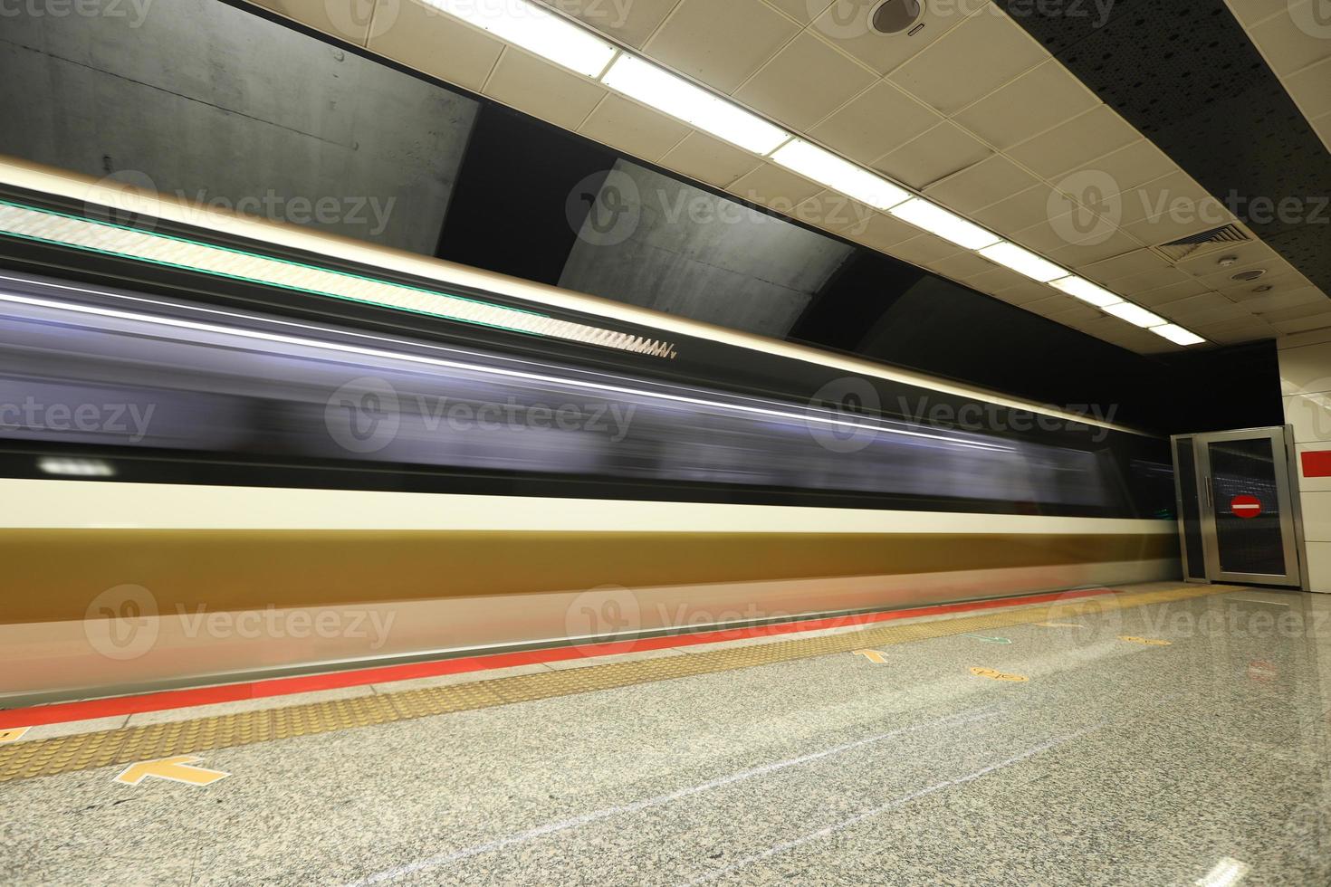 Metro moving in a Station photo