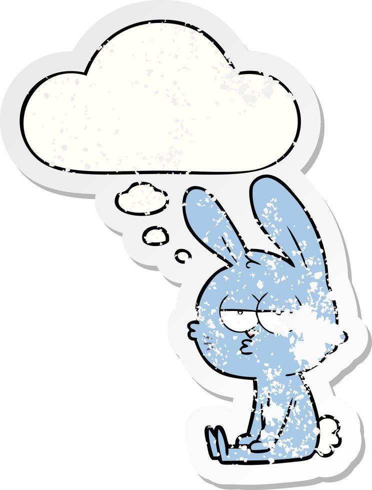 cute cartoon rabbit and thought bubble as a distressed worn sticker vector