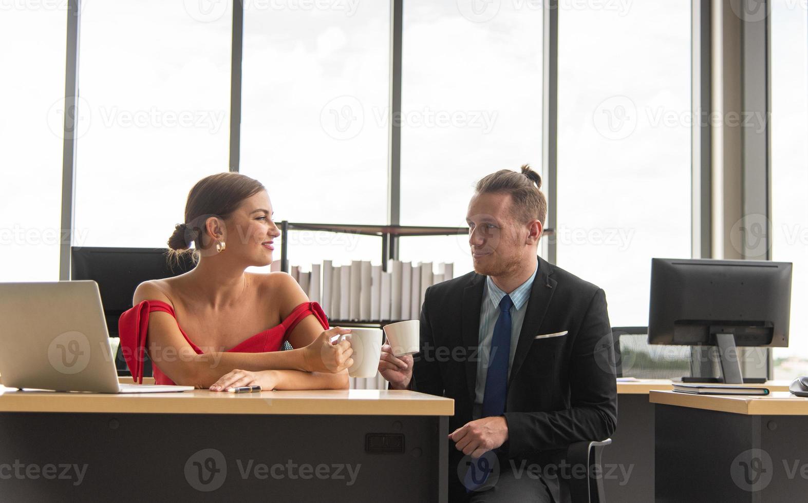 Smiling Business people drinking coffee and have casual meeting in the modern office in digital transformation era photo