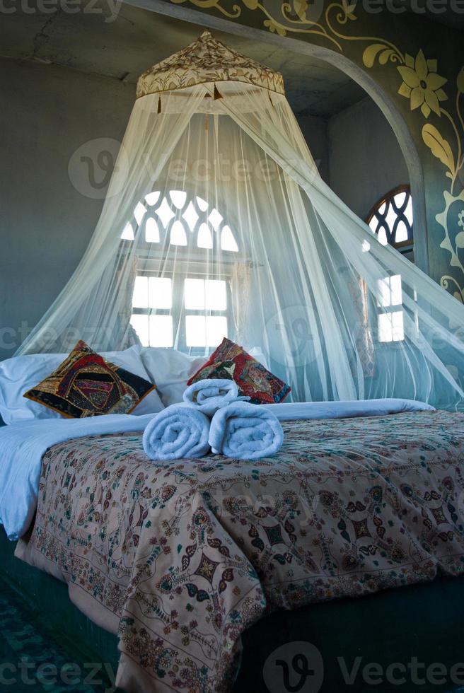 Romantic bed room. Thai style interior bedroom design photo
