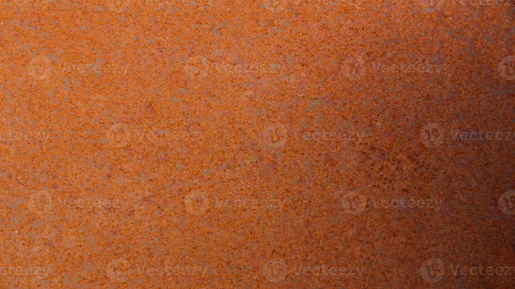 Abstract textures and natural gradient background of completely rusted iron surface photo