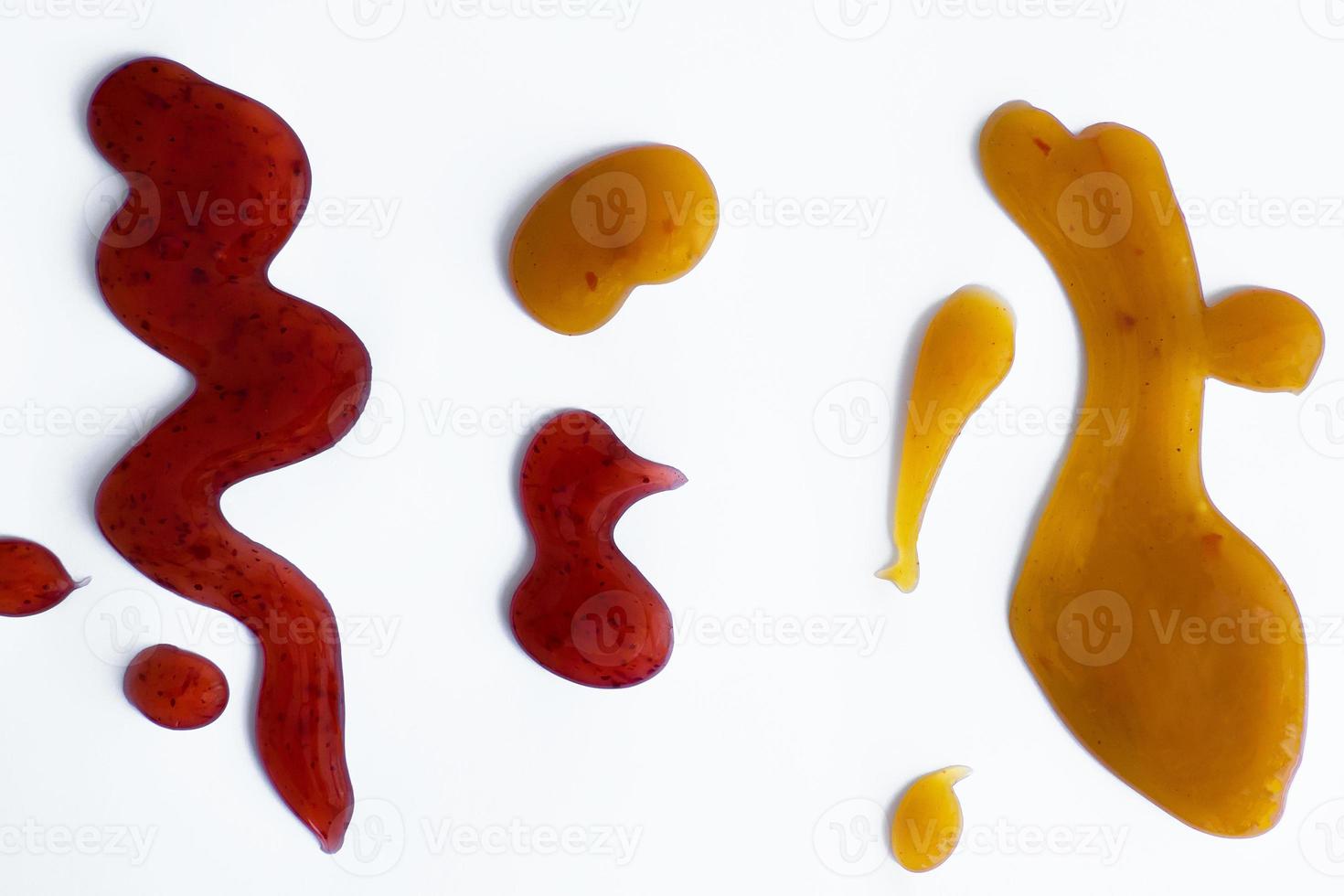 the drops of homemade sauce on a white background photo