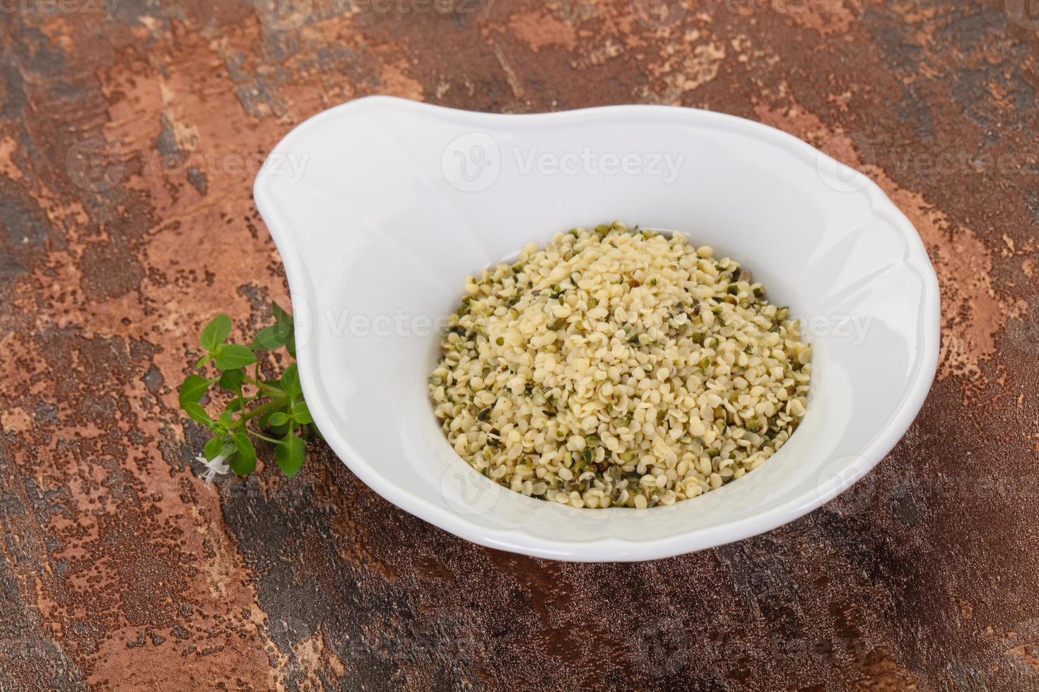 Peeled hemp seeds in the bowl photo