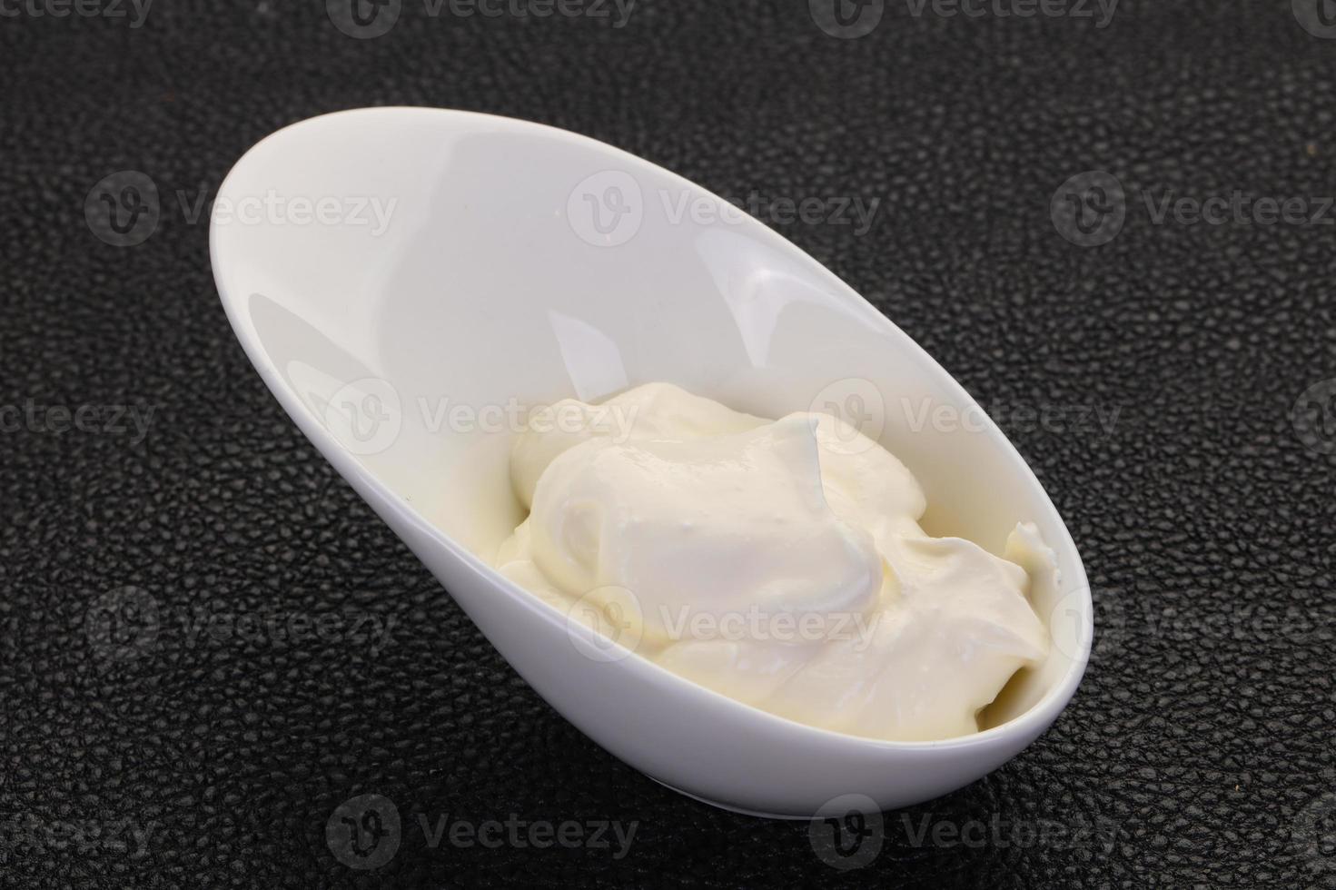 Sour cream in the bowl photo