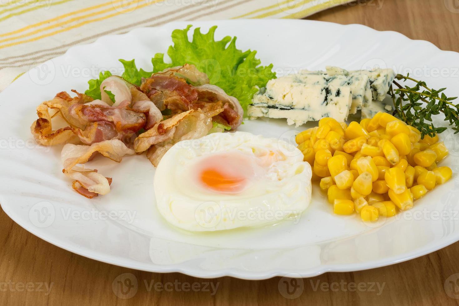 Breakfast with egg and bacon photo