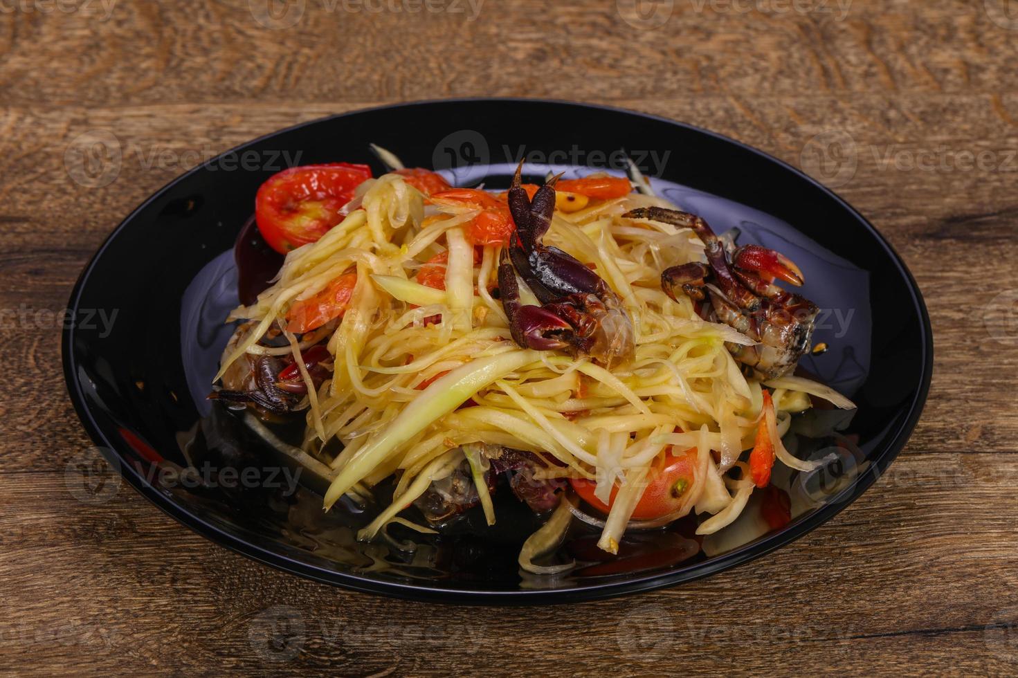 Green mango salad with seafood photo