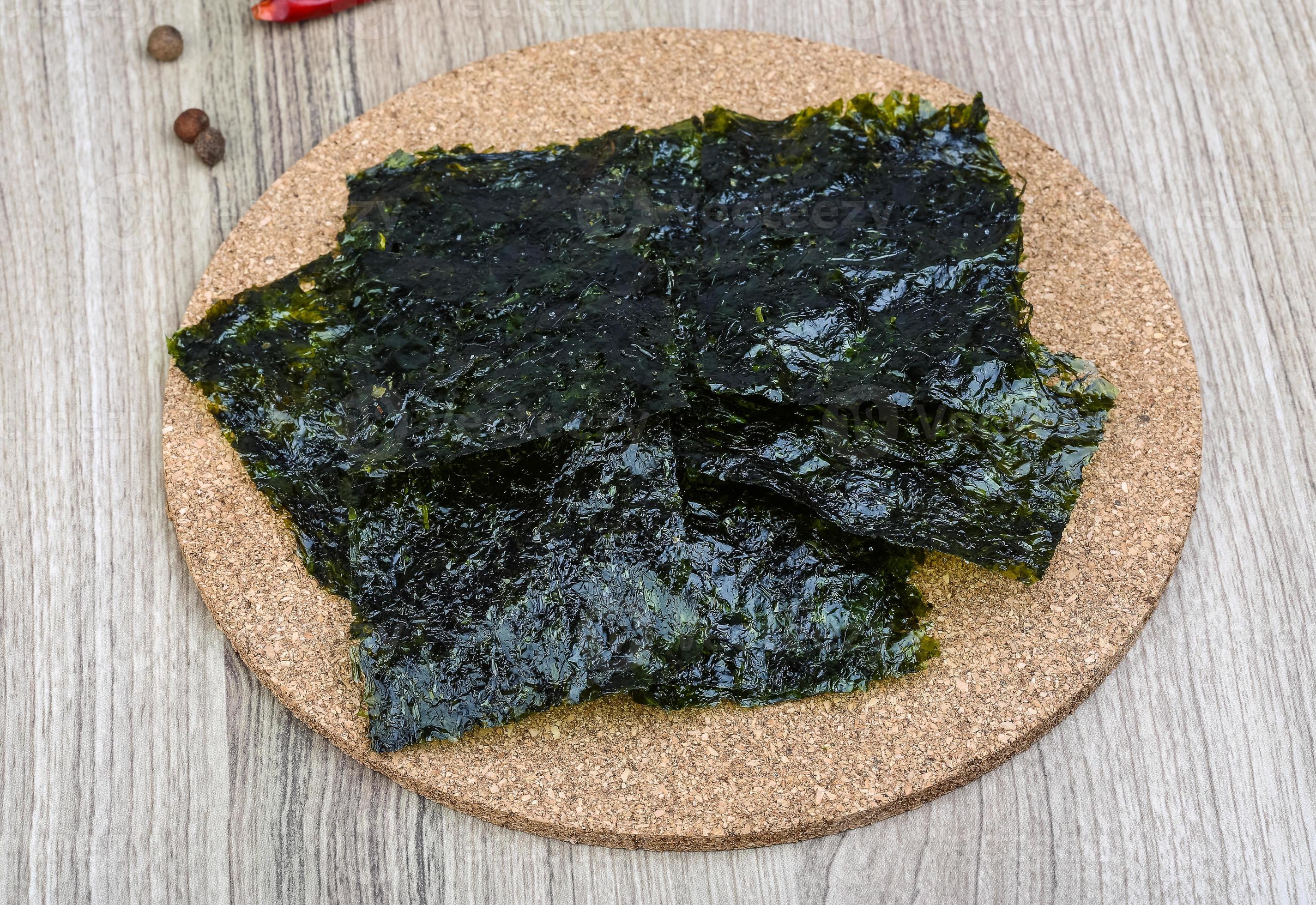Nori seaweed sheets 8583090 Stock Photo at Vecteezy
