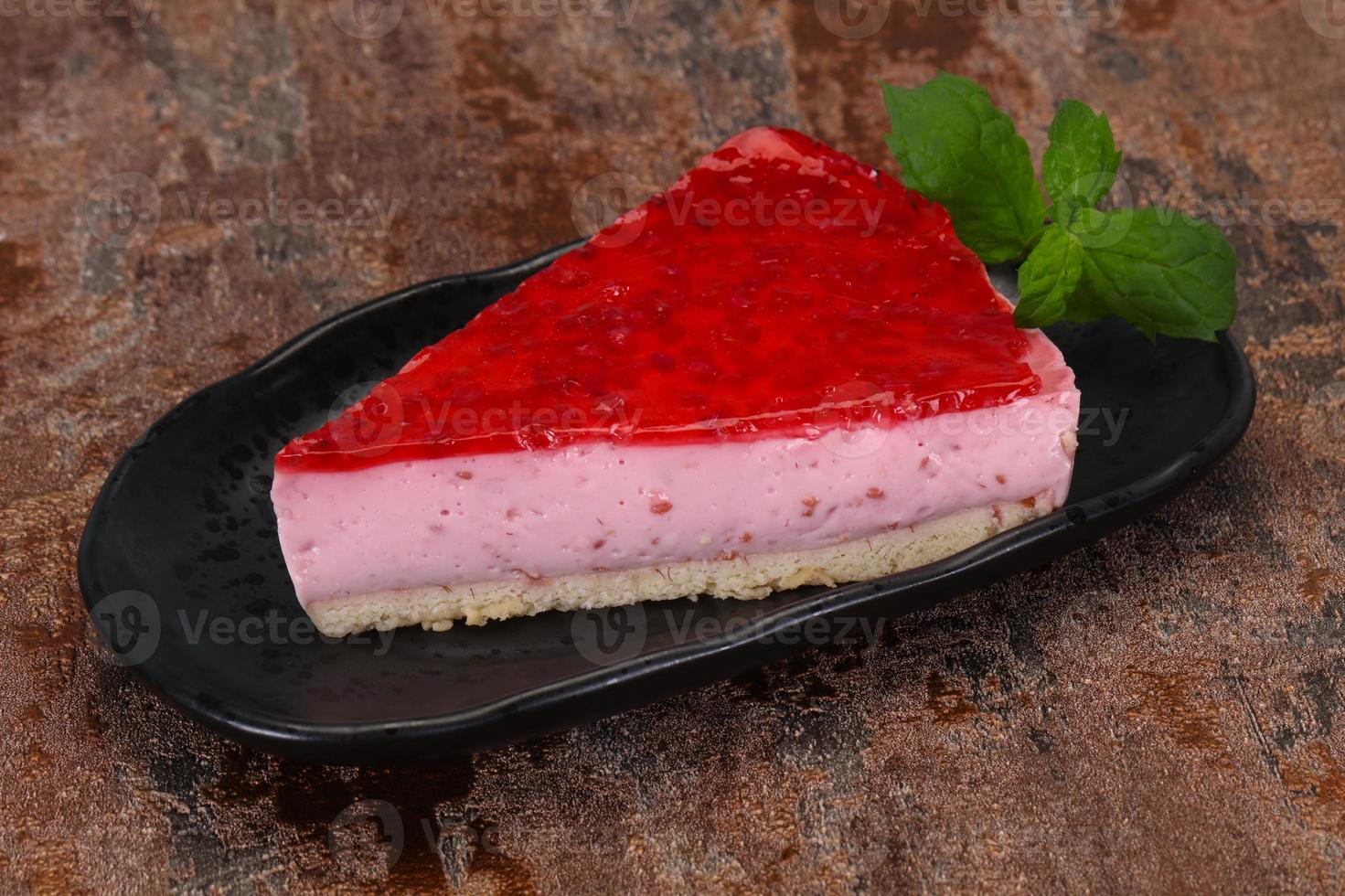 Soft Raspberry cheesecake served mint photo