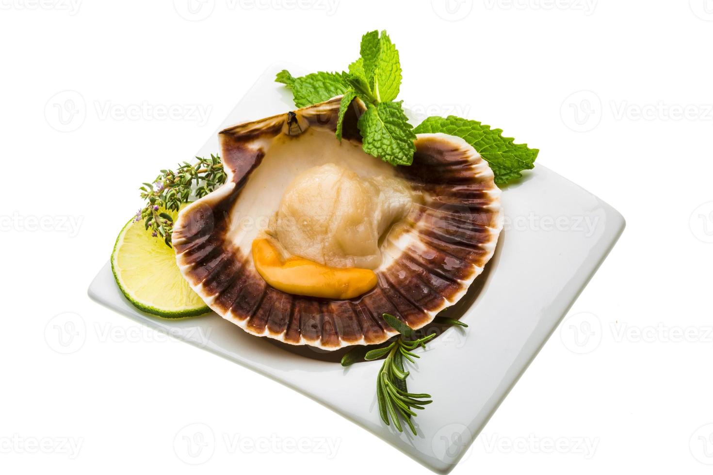 Scallop with asparagus, lime, mint and rosemary photo