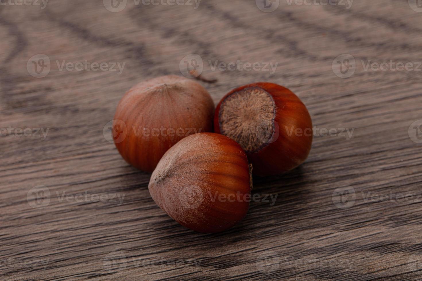Hazelnut heap isolated over background photo