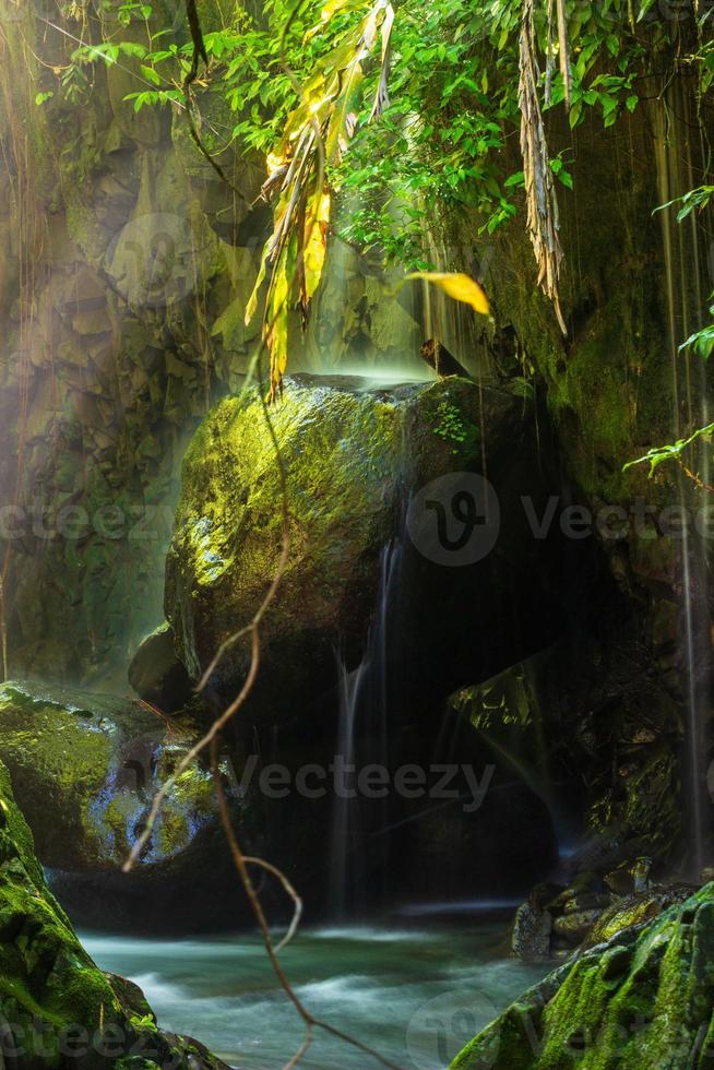 Stone aisle waterfall in North Bengkulu, Indonesia in the morning photo